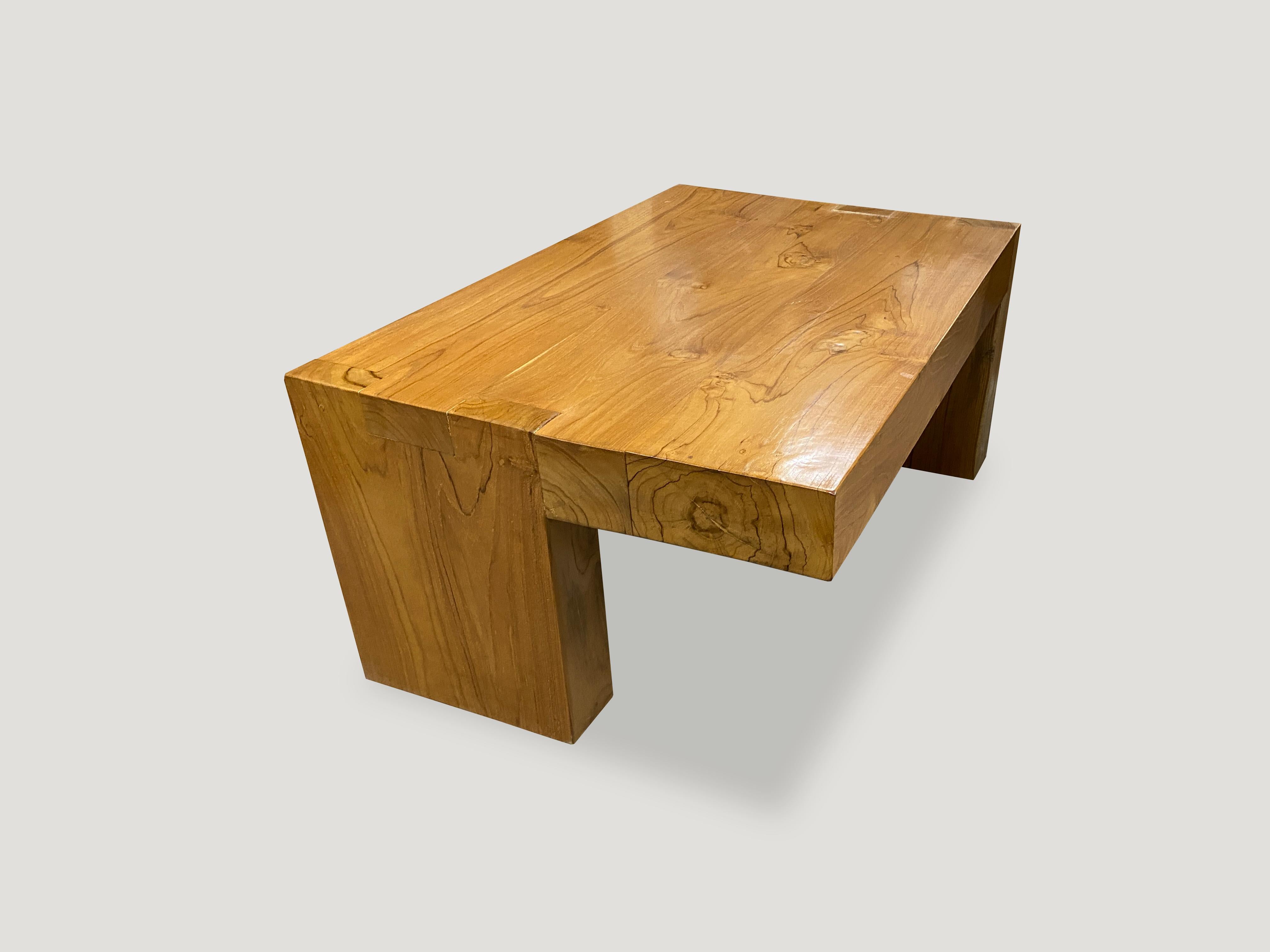 The teak balance coffee table is made from reclaimed teak wood with a four inch top section. Designed with a perfect balance over opposing legs which allows for the piece to float. Custom stains and sizes available. The price reflects the size