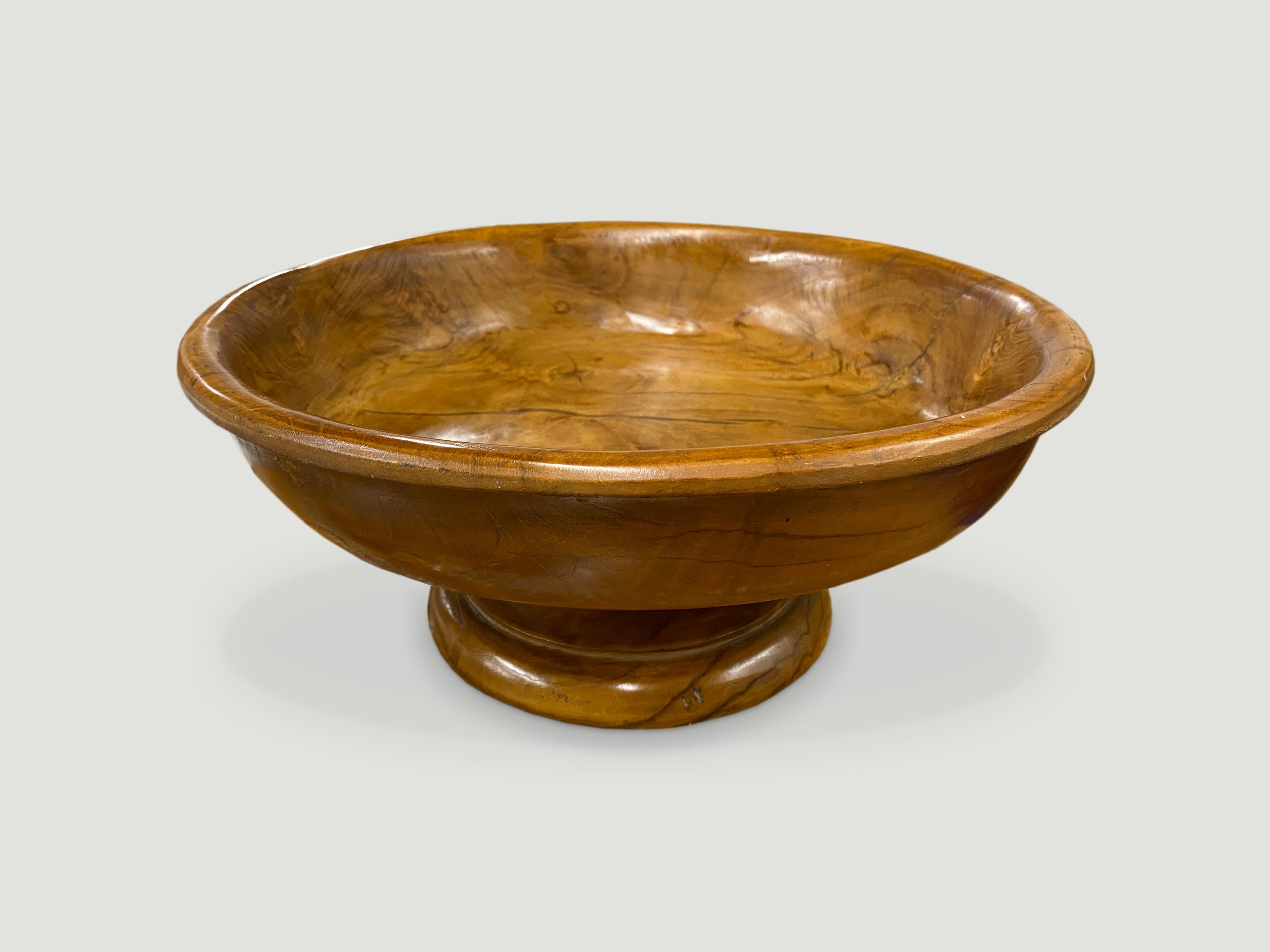 Natural teak hand carved offering tray that has a multitude of applications, from holding fruit, towels or soap in a bathroom. 

Andrianna Shamaris. The Leader In Modern Organic Design.