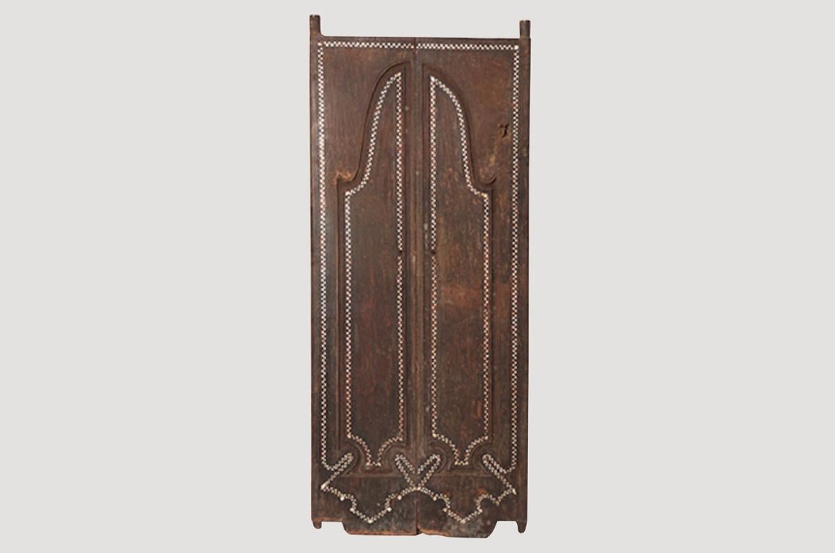 Andrianna Shamaris temple doors in teak wood. We added the shell inlay by hand for that special finish. Great as a headboard or accent piece. Can also be used as a tabletop.

We currently have a large collection of temple doors available in many
