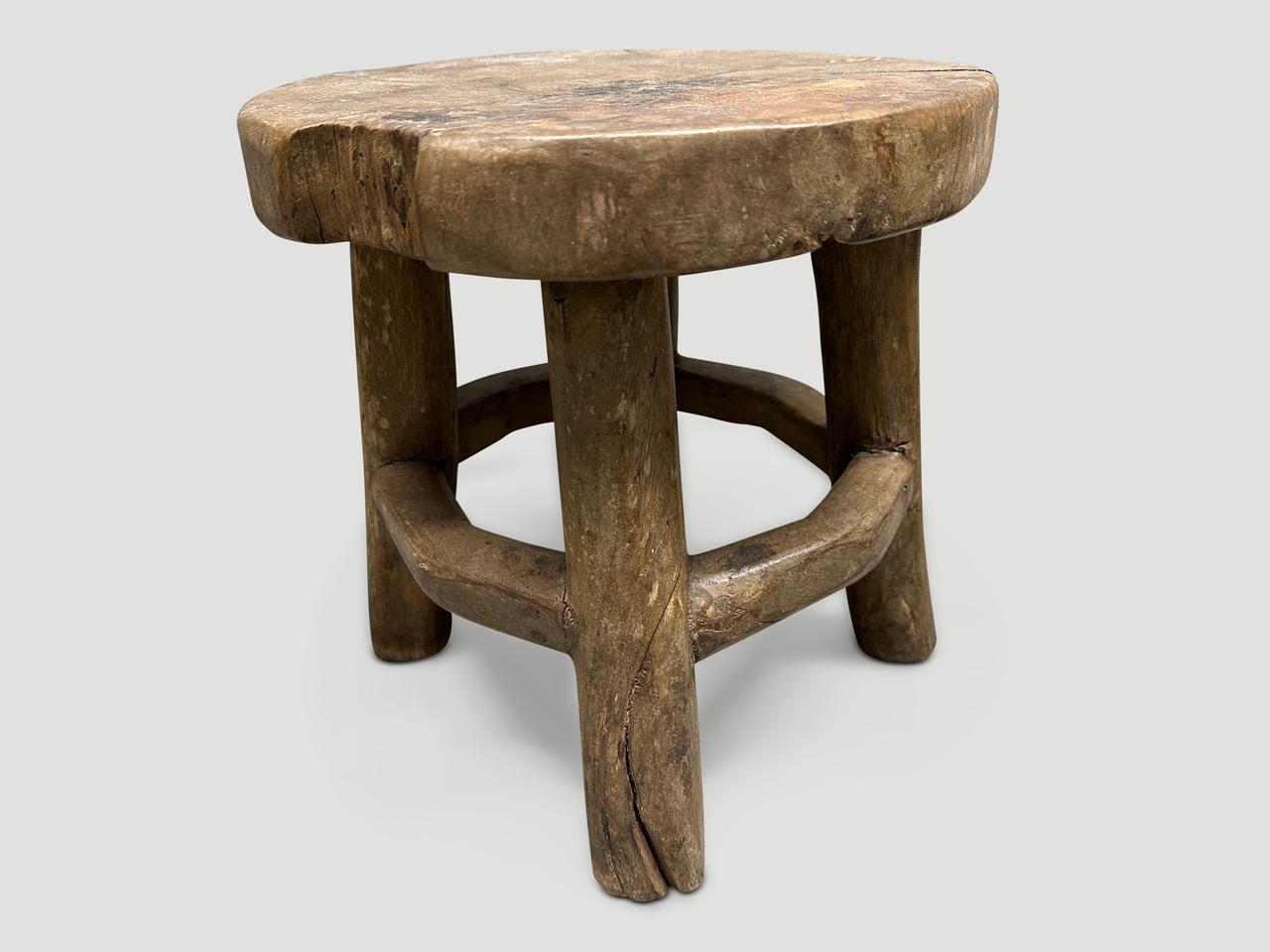 Antique hand made round side table or stool. Celebrating the cracks and crevices and all the other marks that time and loving use have left behind. Circa 1950

This side table or stool was hand made in the spirit of Wabi-Sabi, a Japanese philosophy
