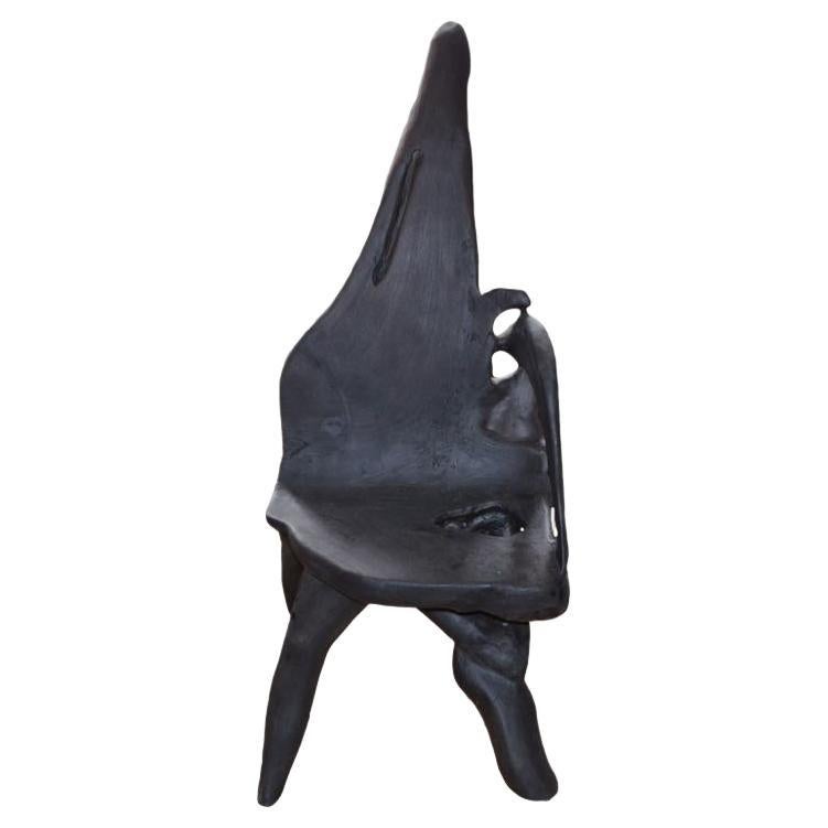 Chaise sculpturale Andrianna Shamaris en bois de teck brûlé à trois têtes