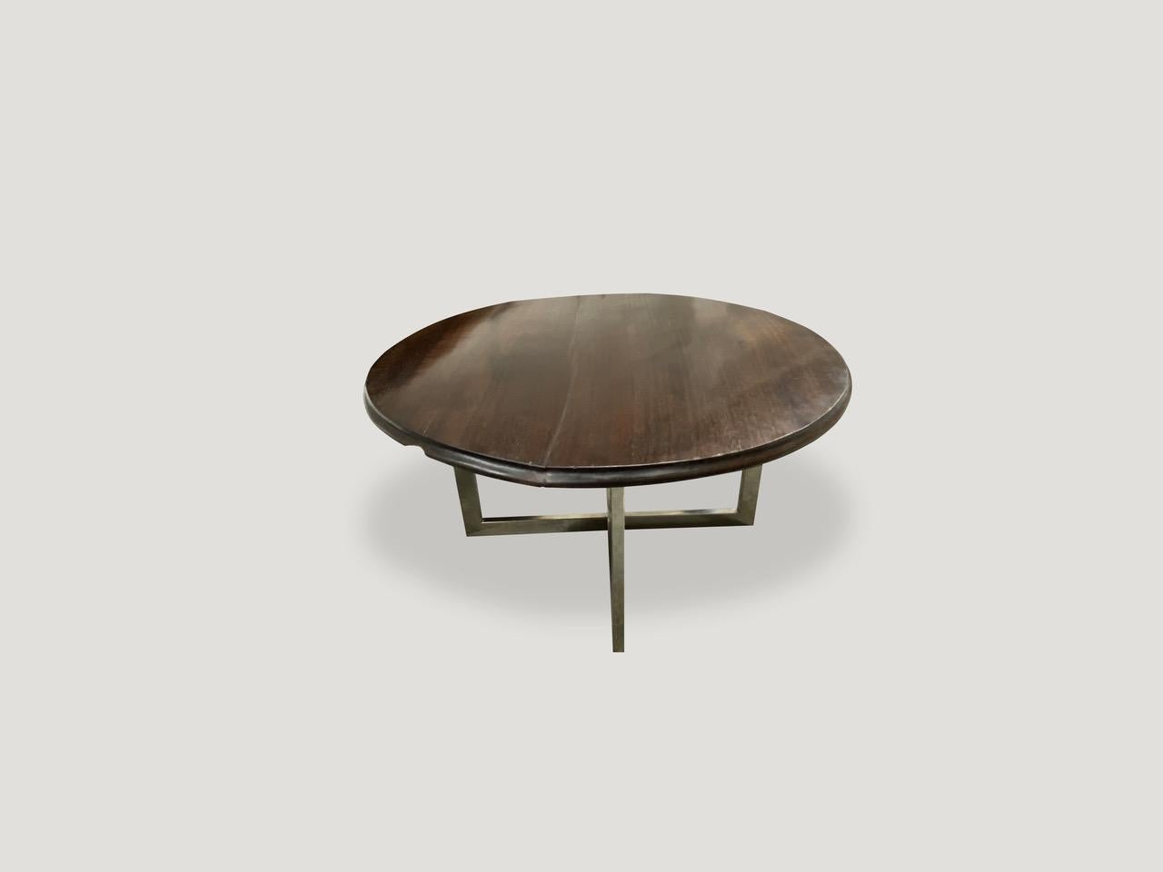 Impressive single slab Ulin wood coffee table from Kalimantan. Stunning patina with a hand carved beveled edge on this 1