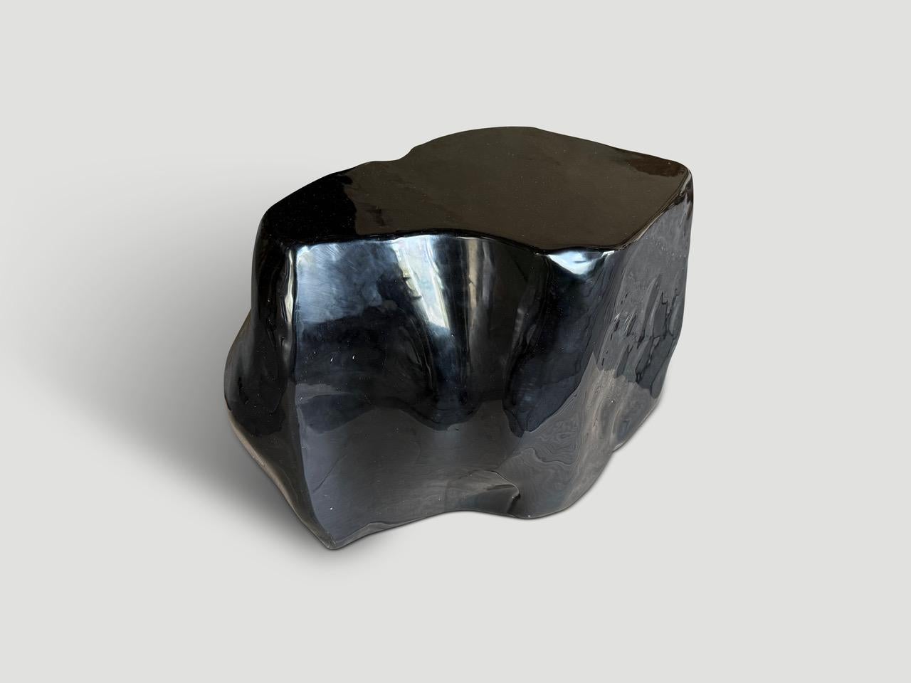 Impressive volcanic glass coffee table or large side table. Obsidian is a naturally occurring volcanic glass formed as an extrusive igneous rock millions of years old.

Extremely multi faceted. It’s rare to find this deep green and such a large