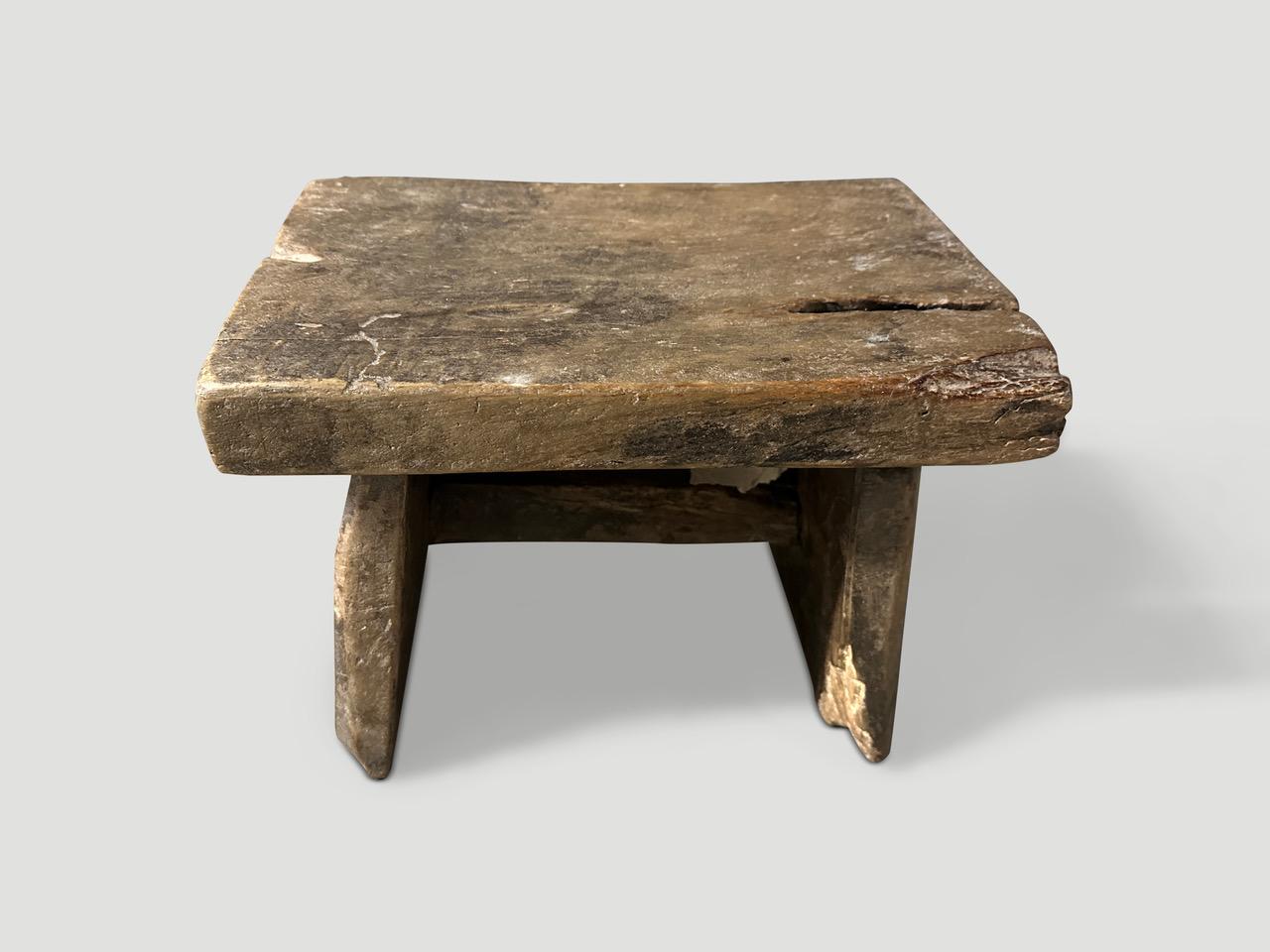 Antique hand made side table or stool. Celebrating the cracks and crevices and all the other marks that time and loving use have left behind. Circa 1950.

This side table or stool was hand made in the spirit of Wabi-Sabi, a Japanese philosophy that