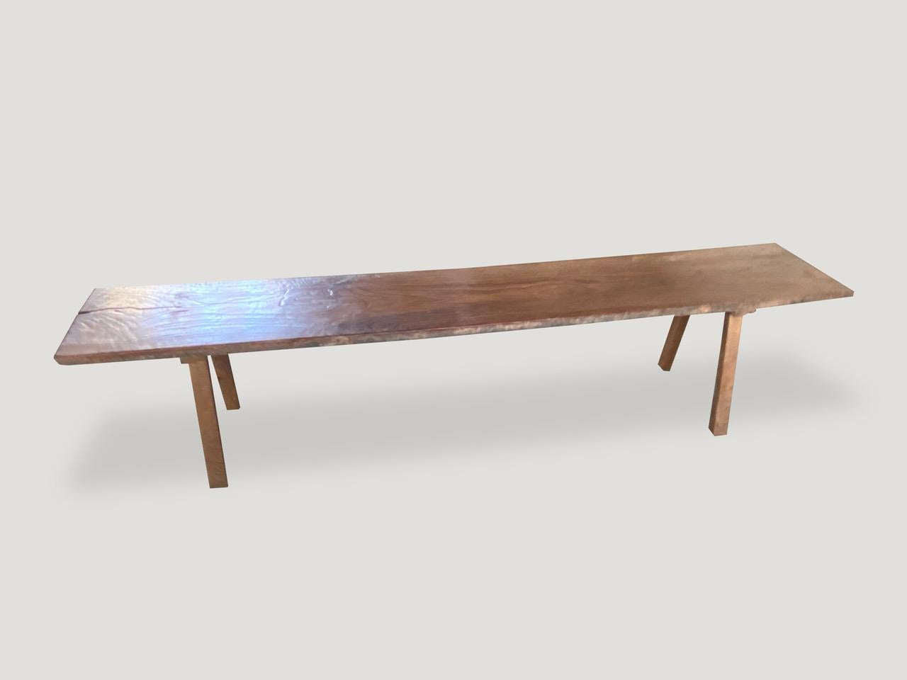 Antique single slab, natural aged teak wood bench. Celebrating the cracks and crevices and all the other marks that time and loving use have left behind.

This bench was sourced in the spirit of wabi-sabi, a Japanese philosophy that beauty can be