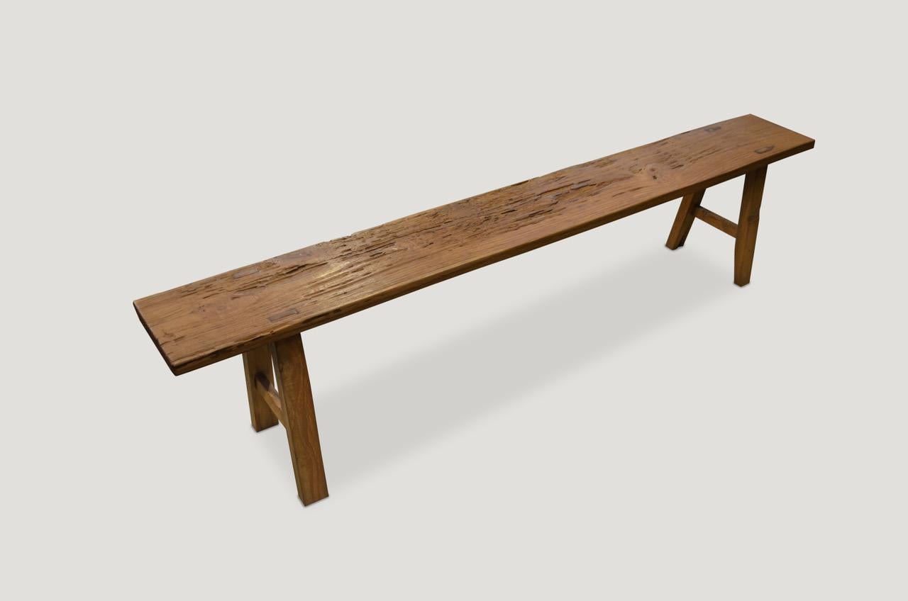 Antique single slab teak wood bench or shelf with beautiful patina and natural smooth erosion.

This bench was sourced in the spirit of wabi-sabi, a Japanese philosophy that beauty can be found in imperfection and impermanence. It’s a beauty of