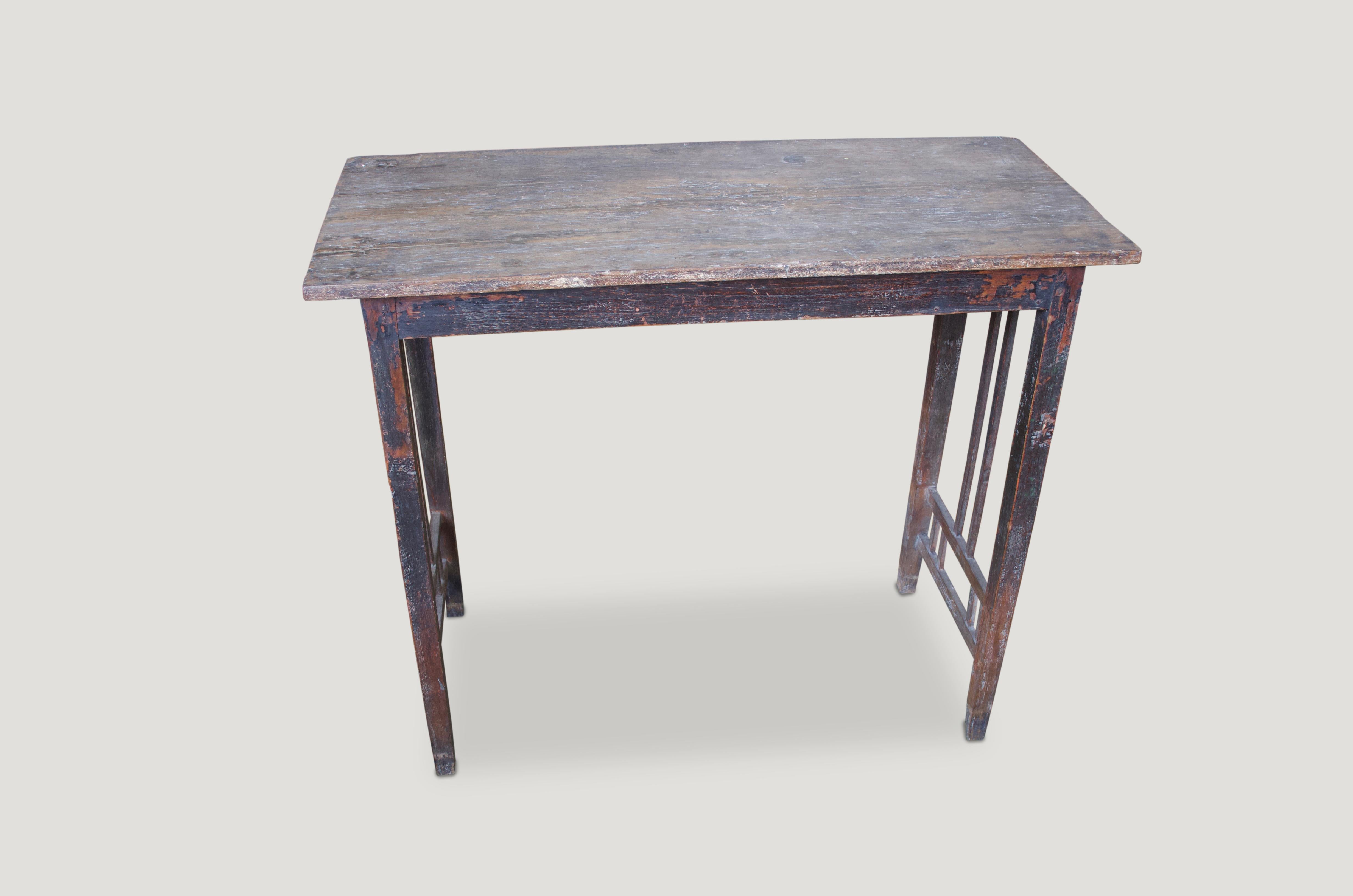 Antique wabi-sabi teak console table with lovely patina and finely cut legs.

This console was sourced in the spirit of wabi-sabi, a Japanese philosophy that beauty can be found in imperfection and impermanence. It’s a beauty of things modest and
