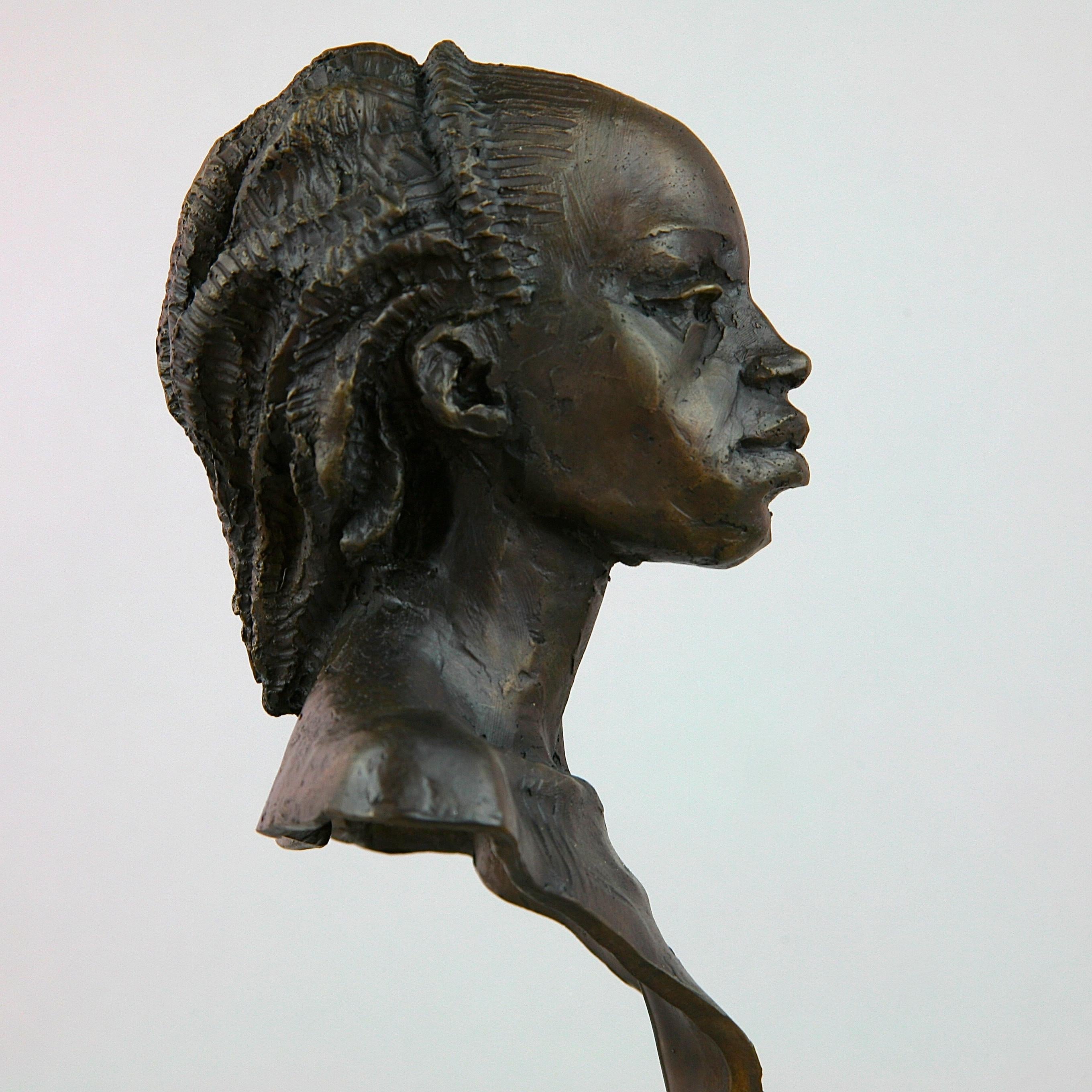 Warrior Woman of Kau Bust bronze sculpture, Limited Edition of 15 is a beautifully sculpted portraiture piece by Andrzej Szymczyk. 

Andrzej graduated with an MA degree in Fine Arts in the faculty of Sculpture from The Academy of Fine Arts in Krakow