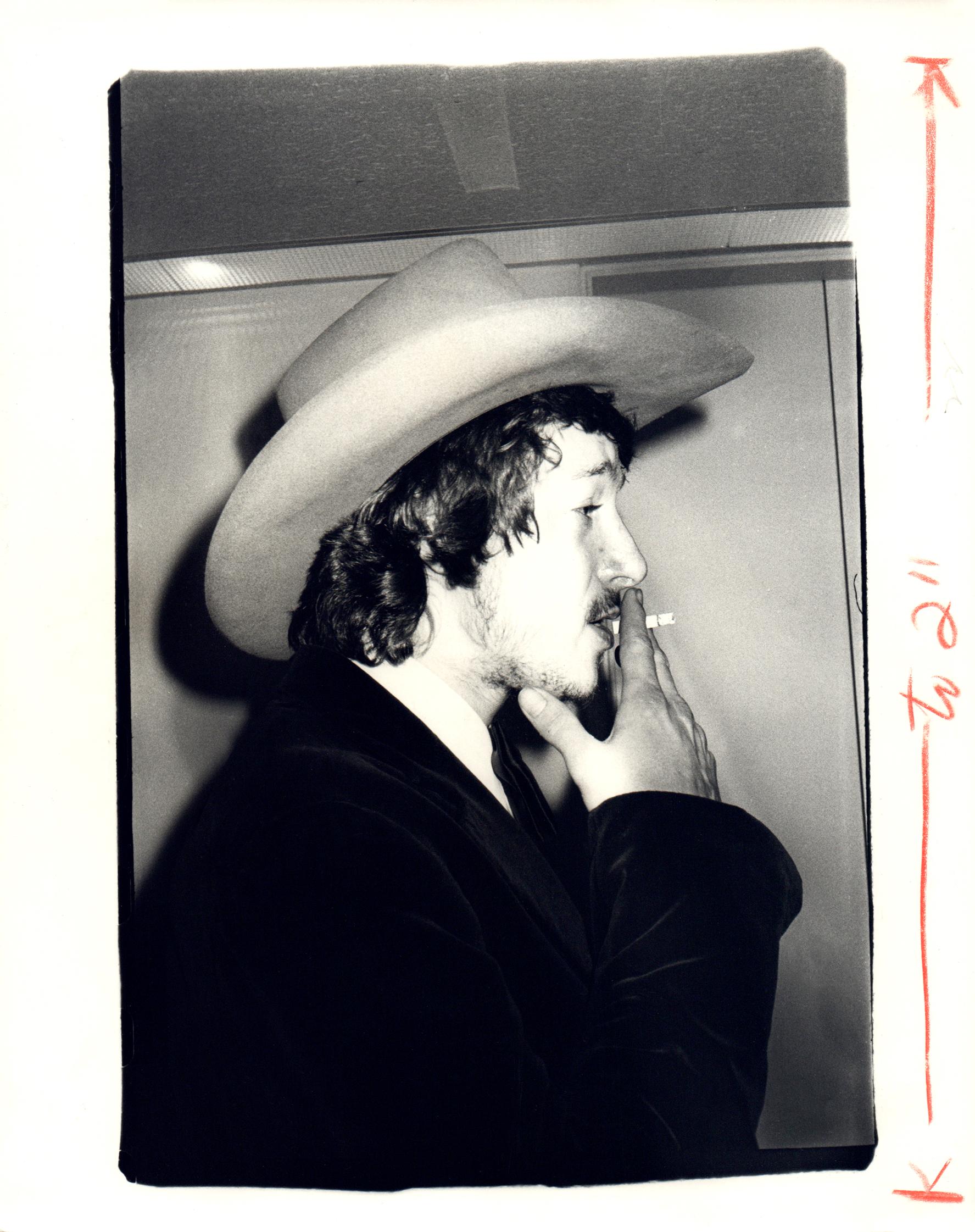 Andy Warhol Portrait Photograph - Man in a Cowboy Hat Smoking