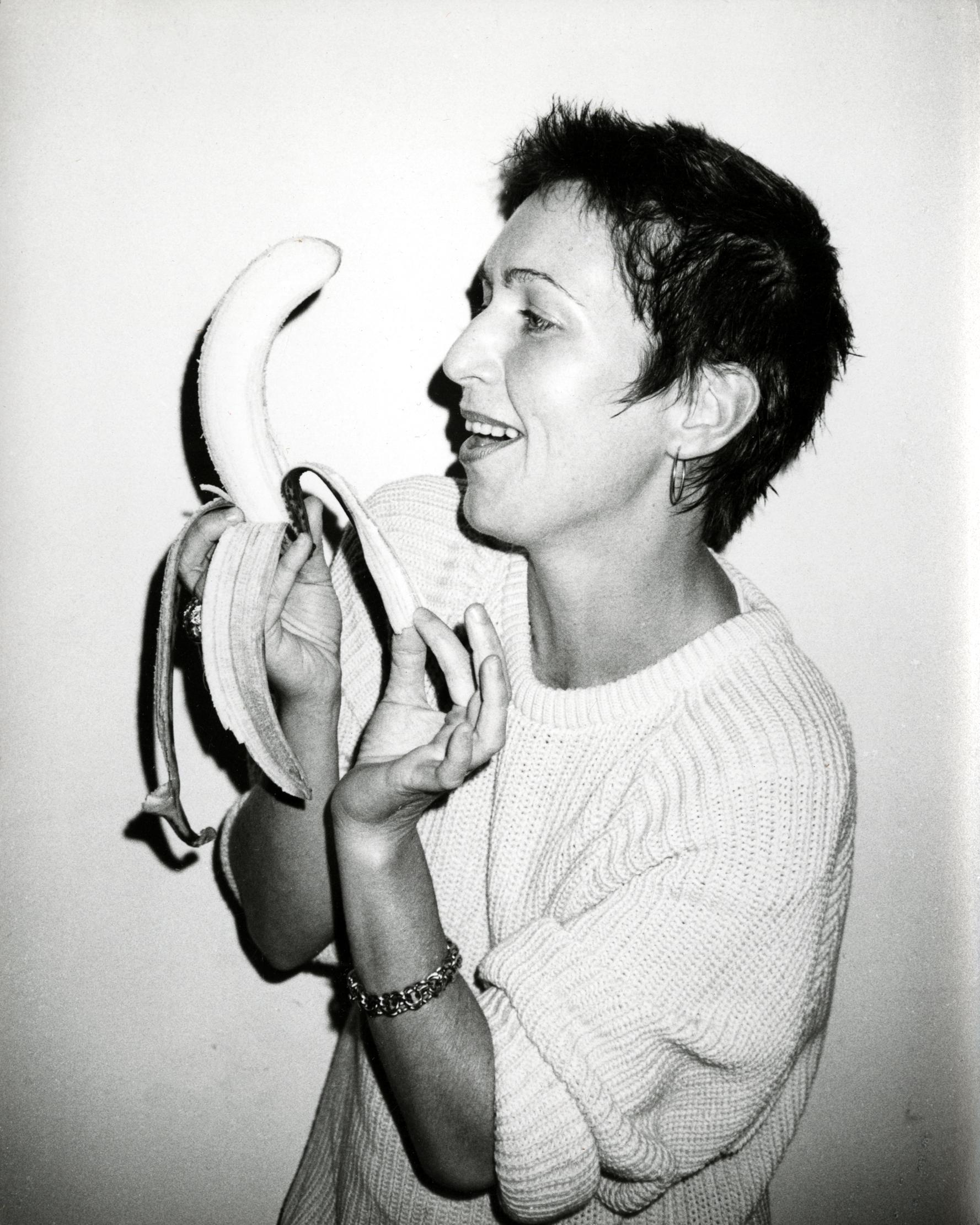 Andy Warhol Portrait Photograph - Photograph of Pat Hackett Peeling a Banana