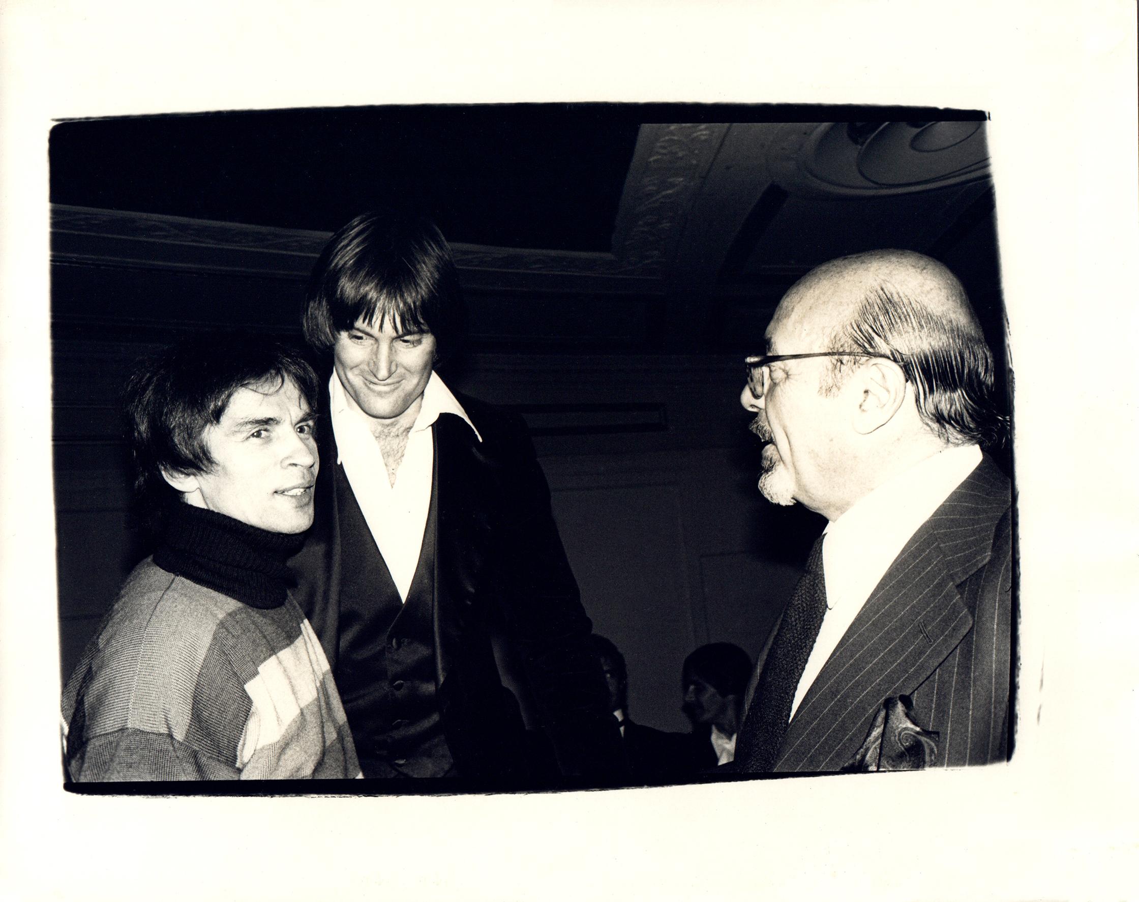 Andy Warhol Black and White Photograph - Rudolf Nureyev, Bruce Jenner, and Ahmet Ertegen