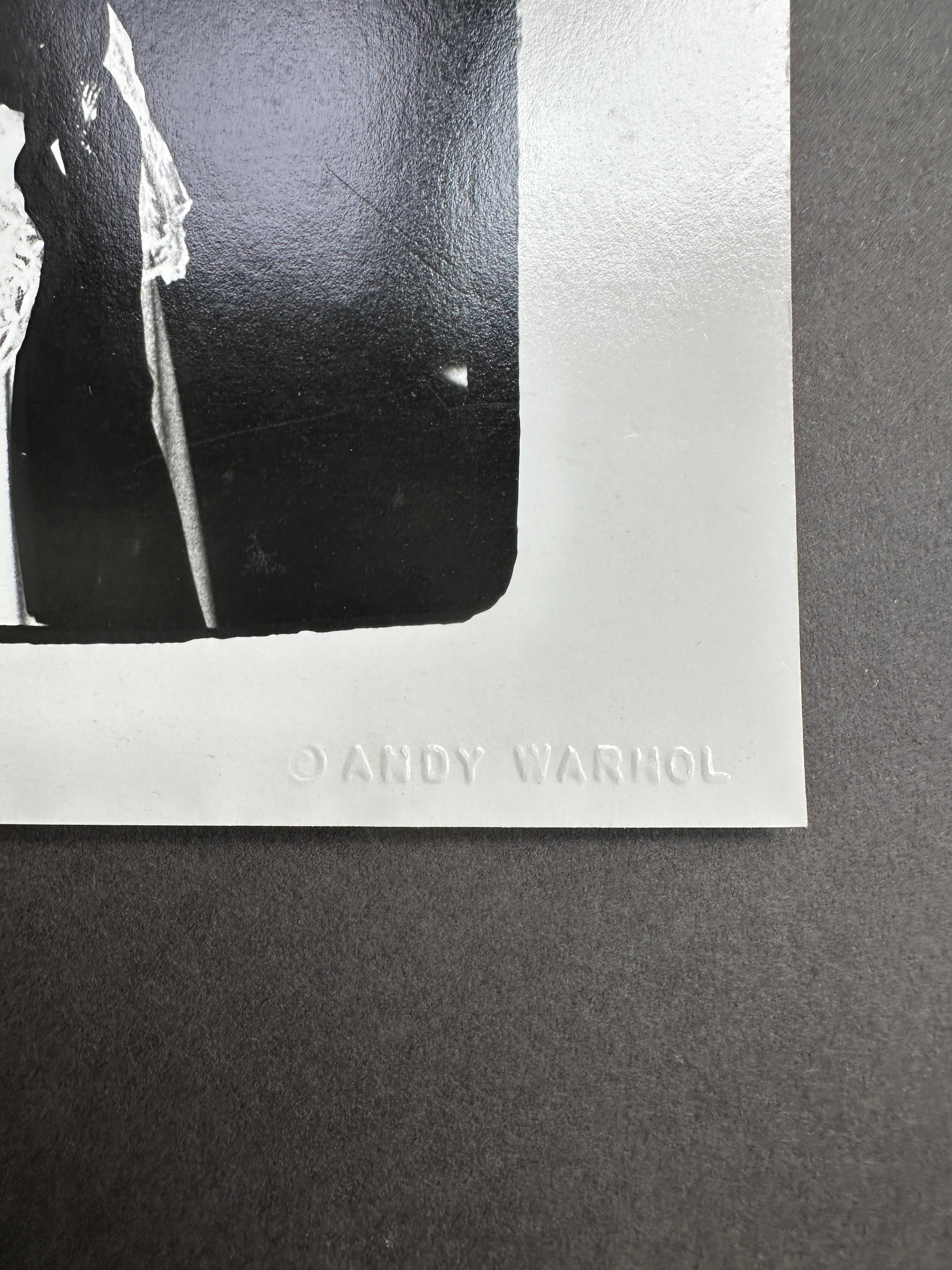 Bianca Jagger und Bob Colacello (Schwarz), Black and White Photograph, von Andy Warhol