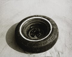 Gelatin silver print of Tire in Sand by Andy Warhol