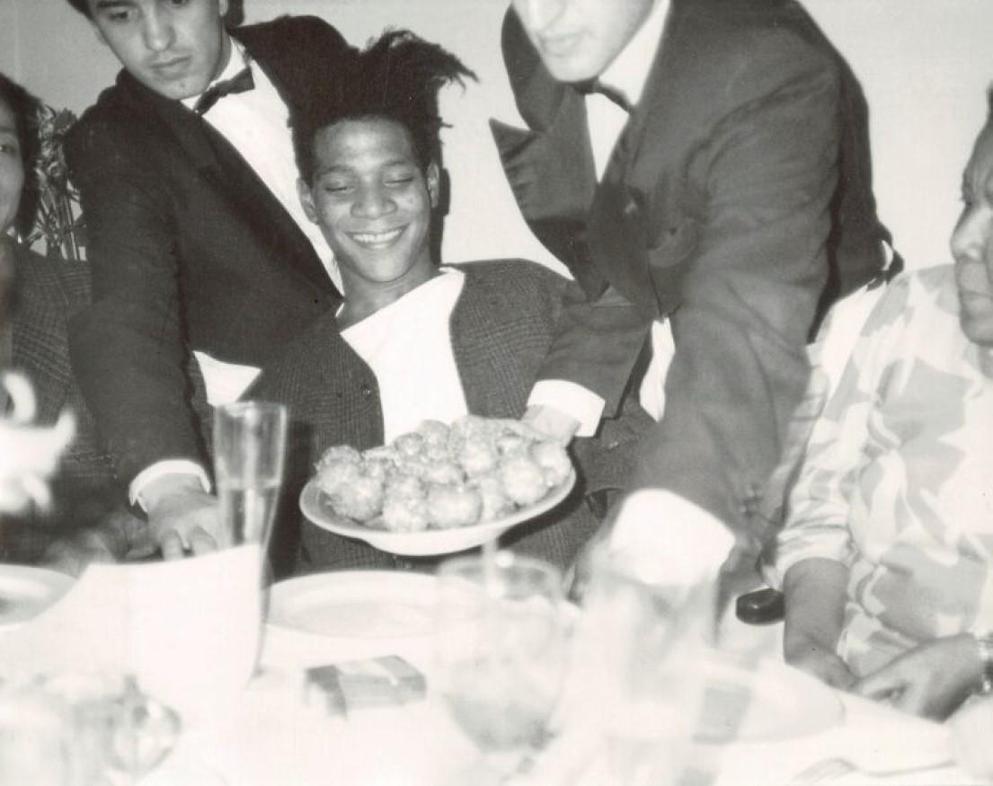 Andy Warhol Black and White Photograph - Jean-Michel Basquiat at Mr. Chow