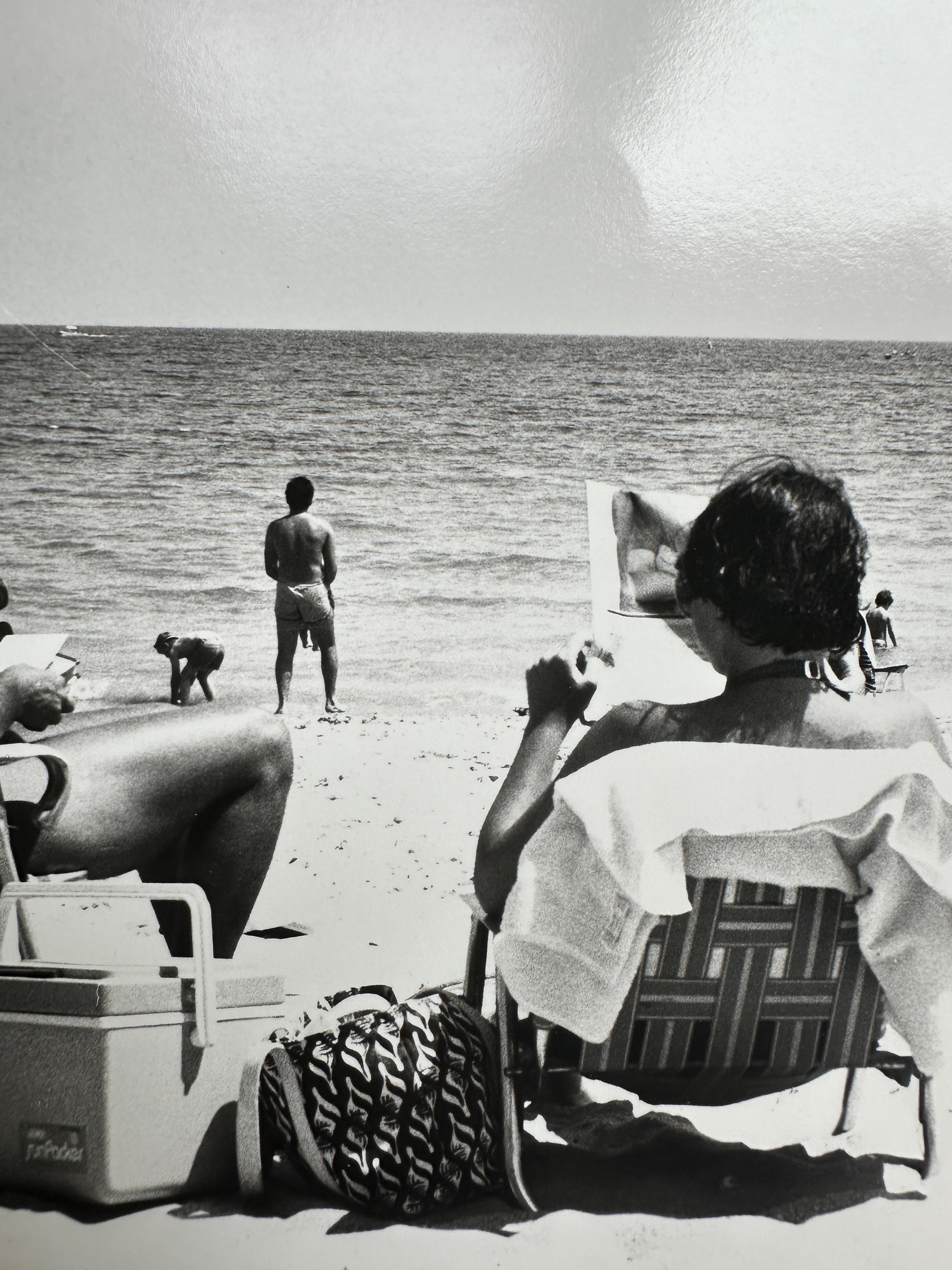 Jon Gould Observing Palm Beach Scene - Gray Black and White Photograph by Andy Warhol