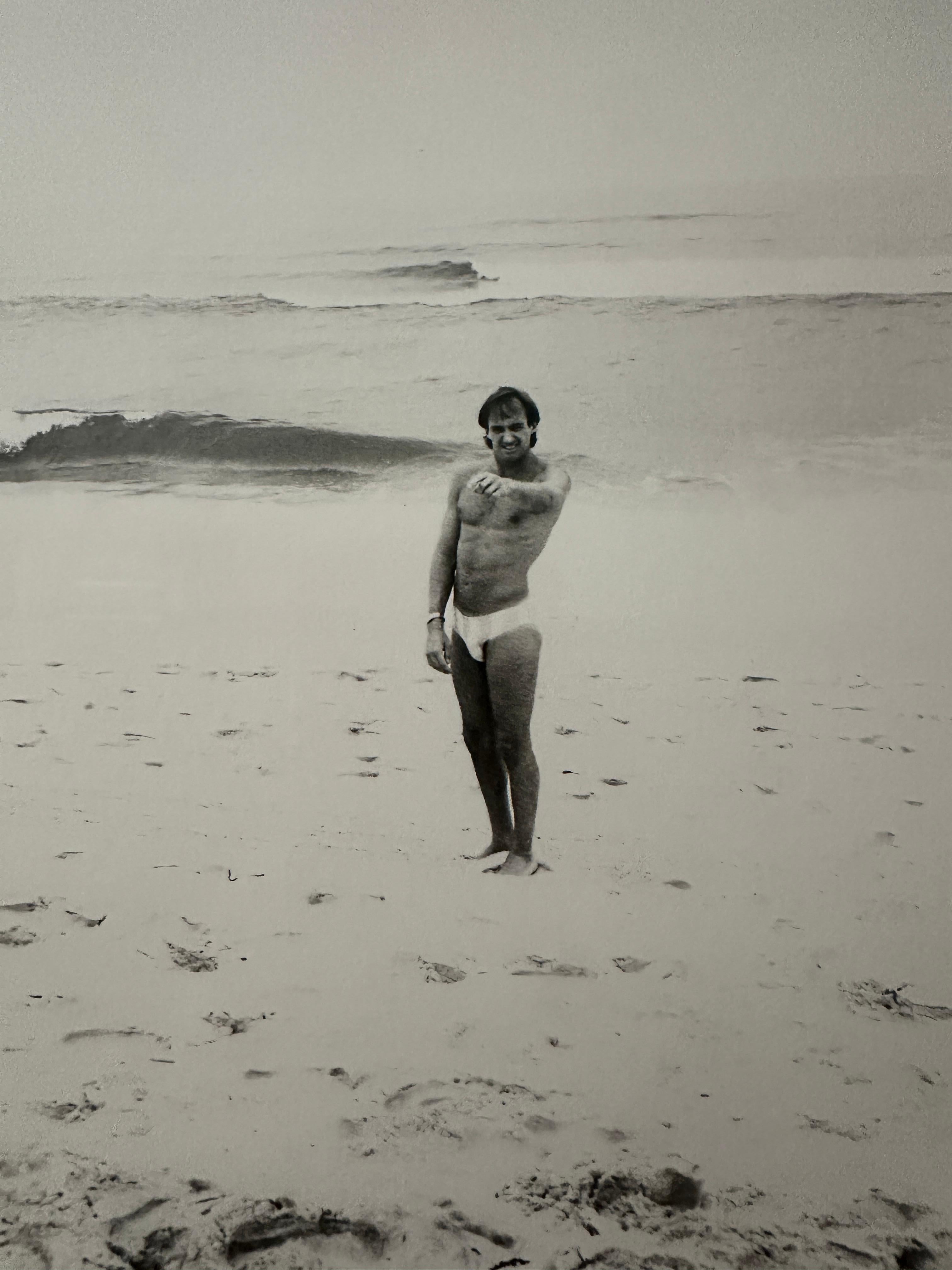 Jon Gould Pointing on Fire Island Beach - Pop Art Photograph by Andy Warhol