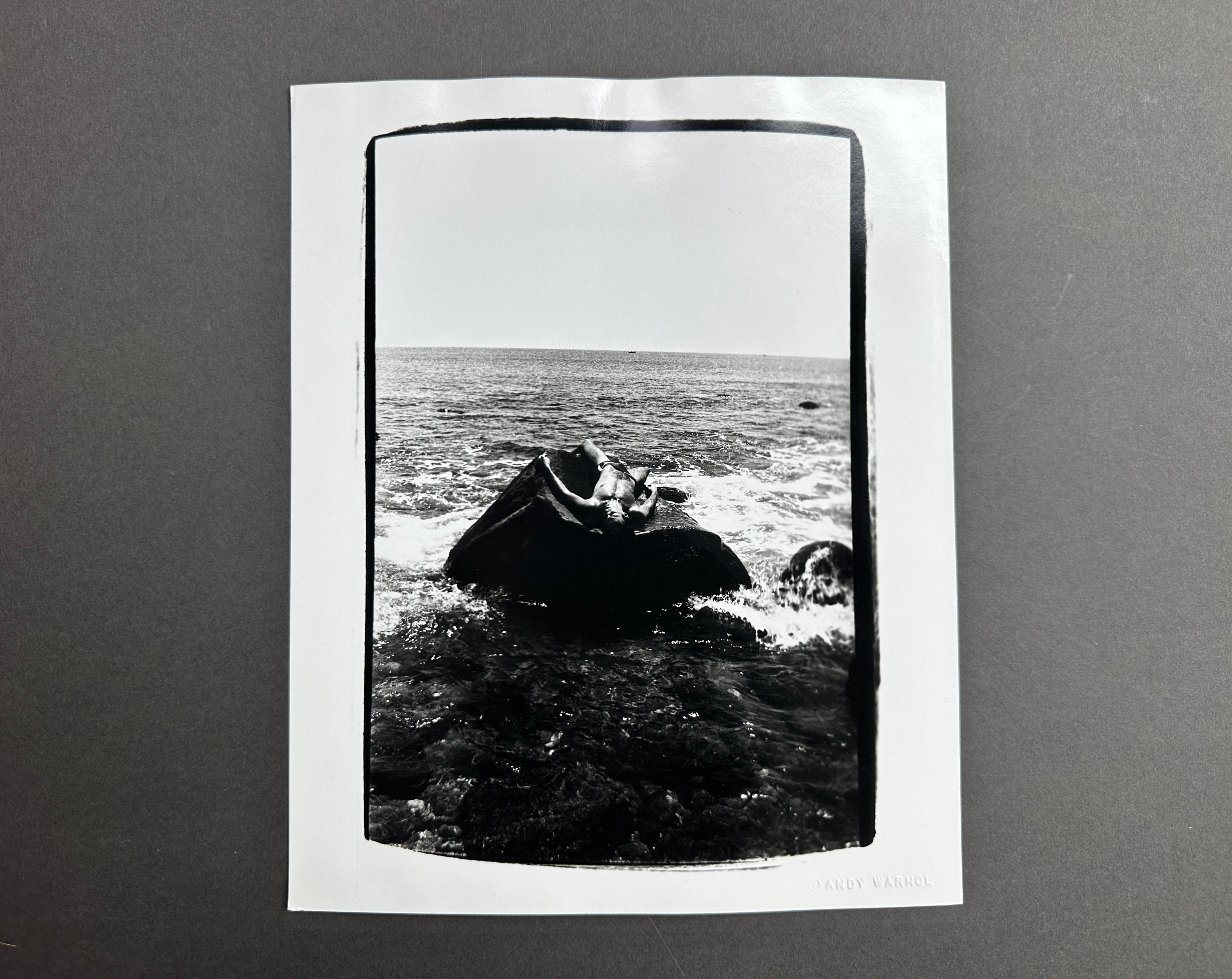 Jon Gould steso su una roccia a Montauk - Photograph Pop Art di Andy Warhol