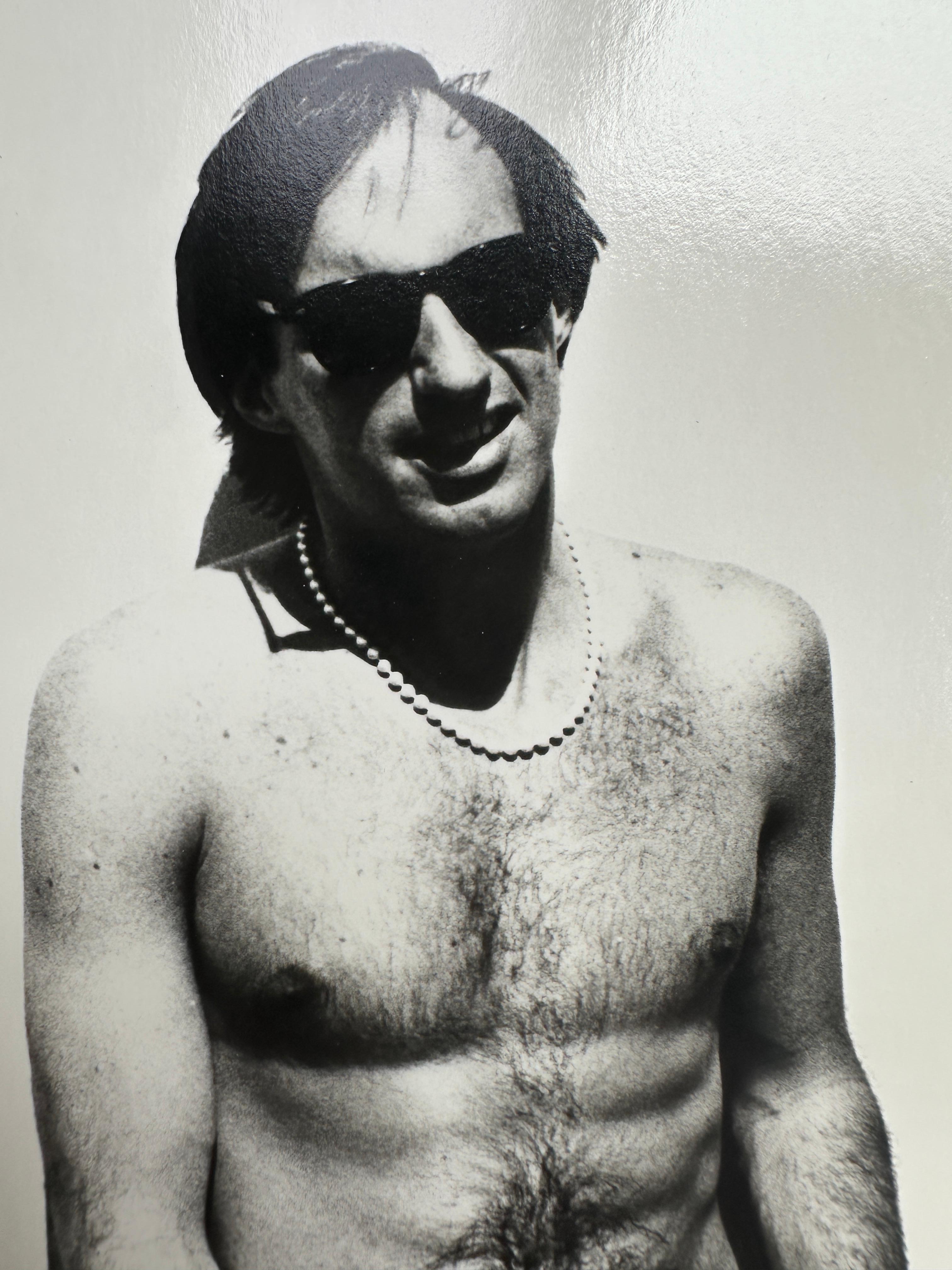 From The Jon Gould Collection of Andy Warhol Photographs 

This work is not signed by the artist, however, each photo is unique and blind embossed “Andy Warhol” in the lower right corner (pictured). This item has not been officially stamped by The