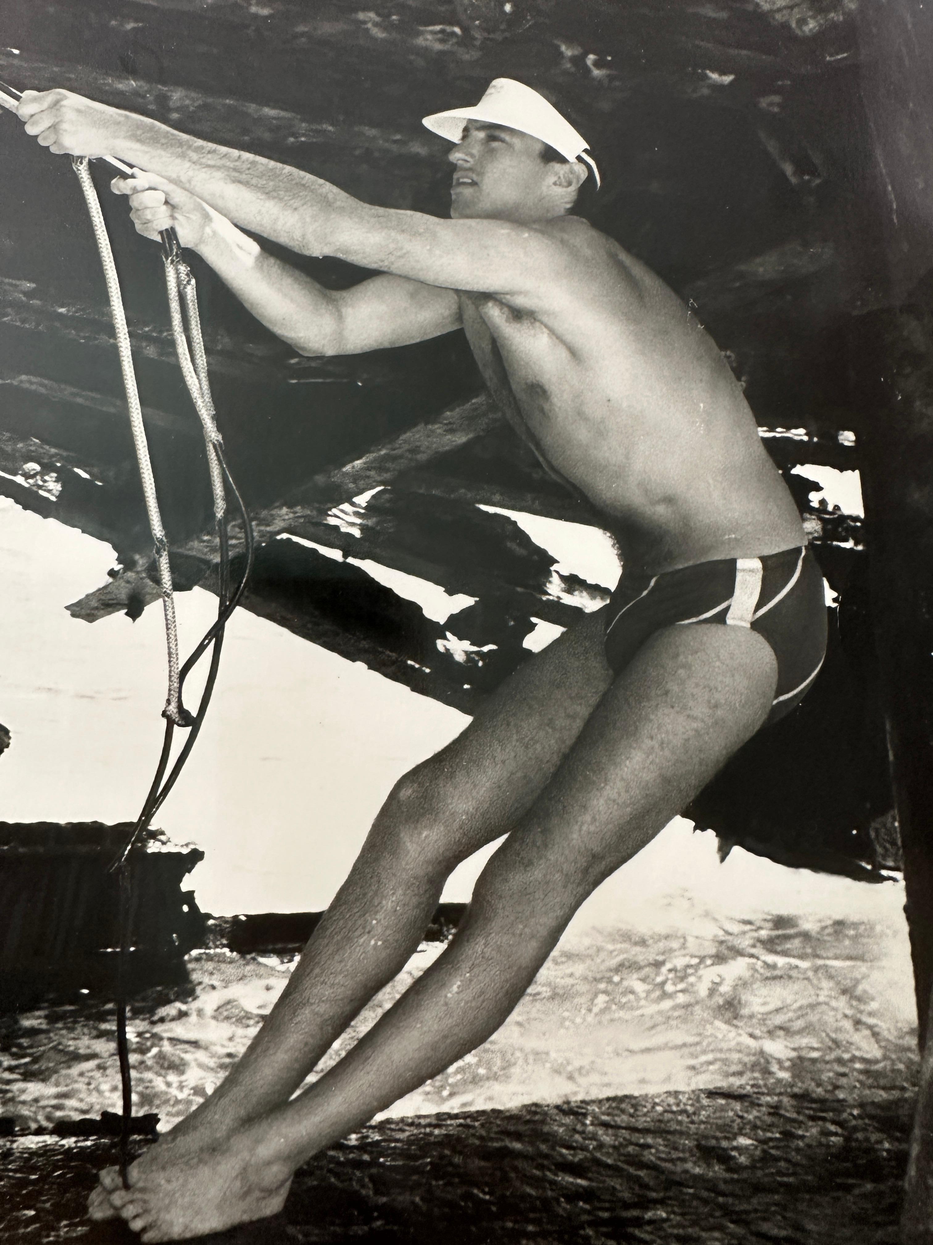 Jon Gould Swinging on Rope (11 x 14 pouces) - Noir Black and White Photograph par Andy Warhol