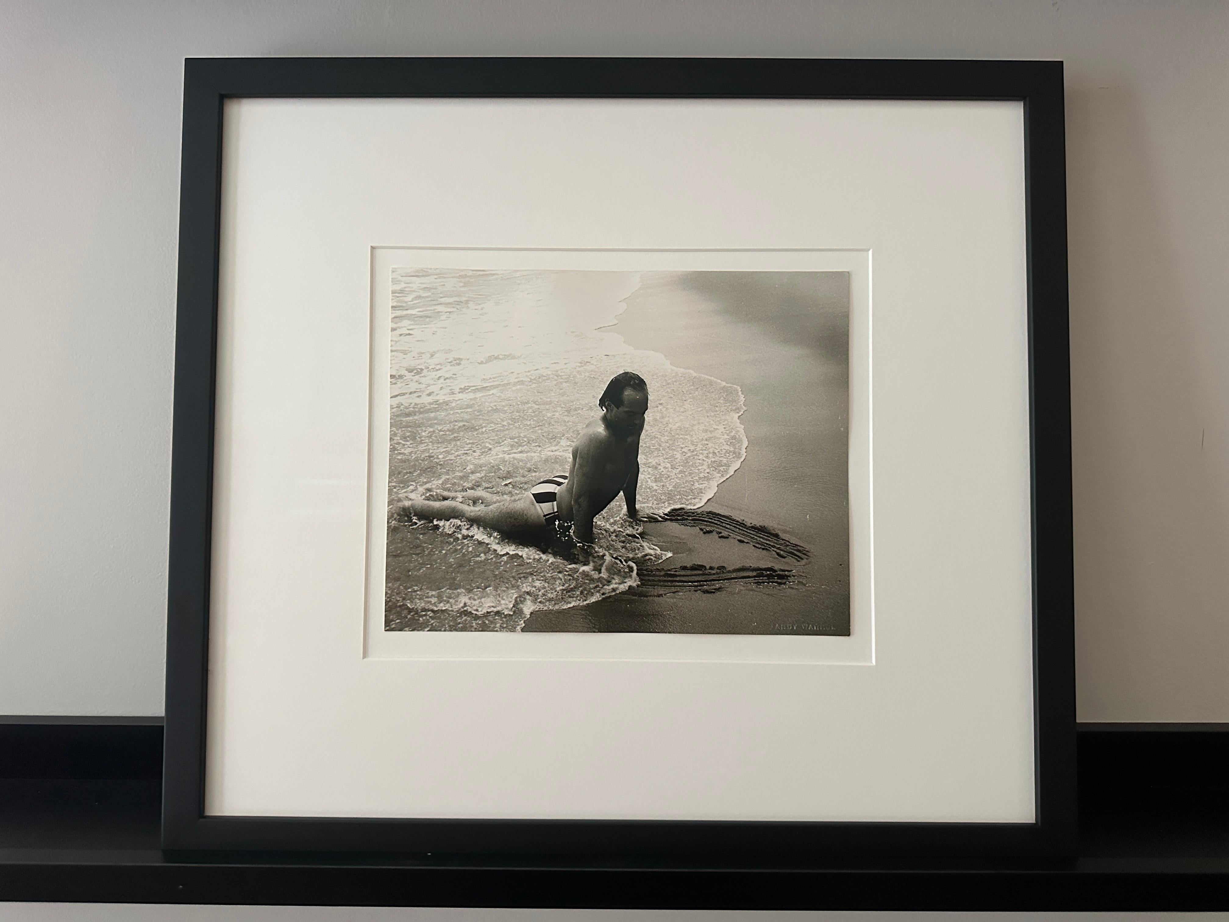 Jon Gould au surf à Montauk - Photograph de Andy Warhol
