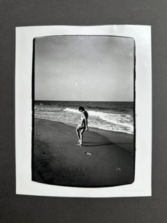 Jon Gould Walking in Surf