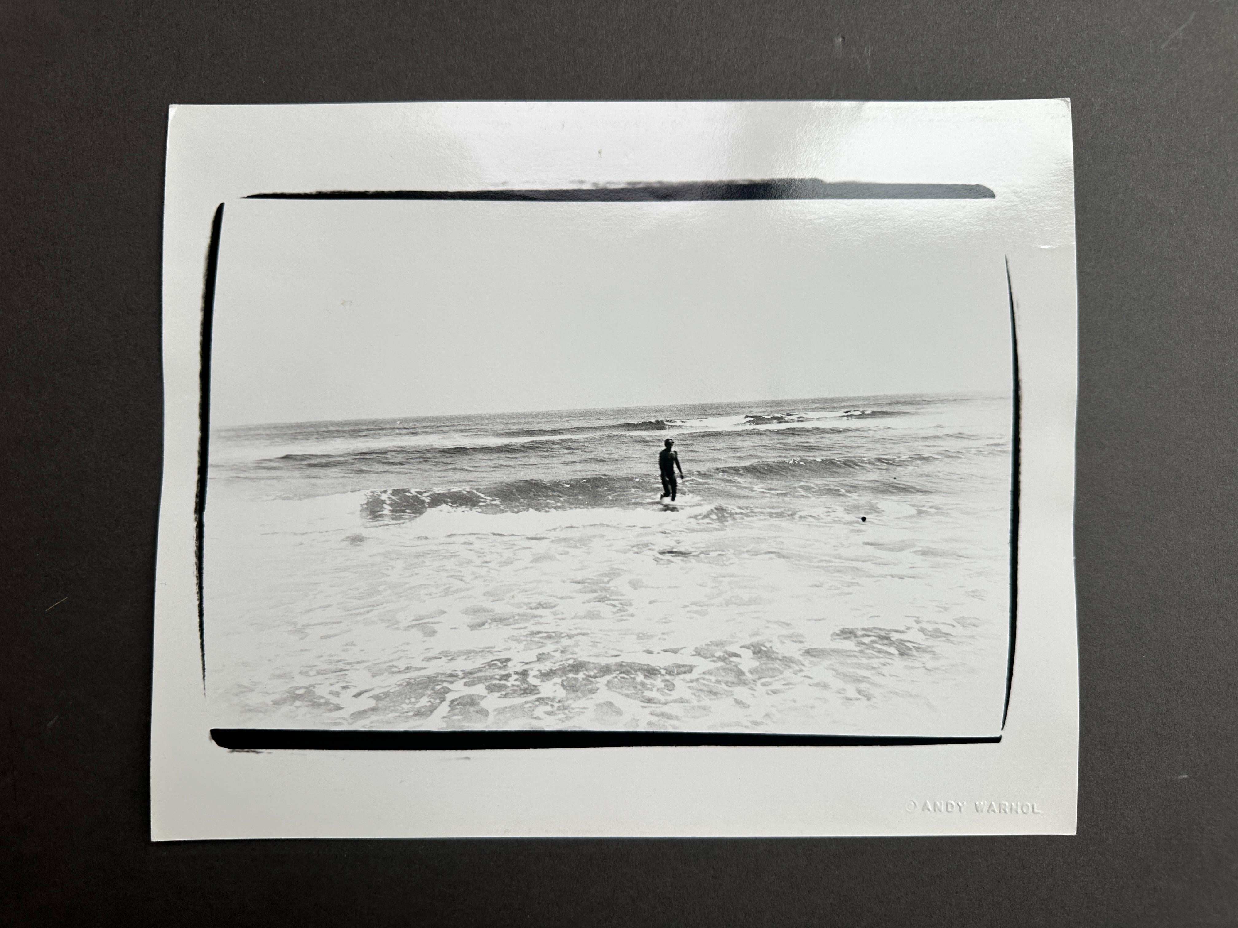 Jon Gould che cammina nel surf a Montauk - Photograph Pop Art di Andy Warhol