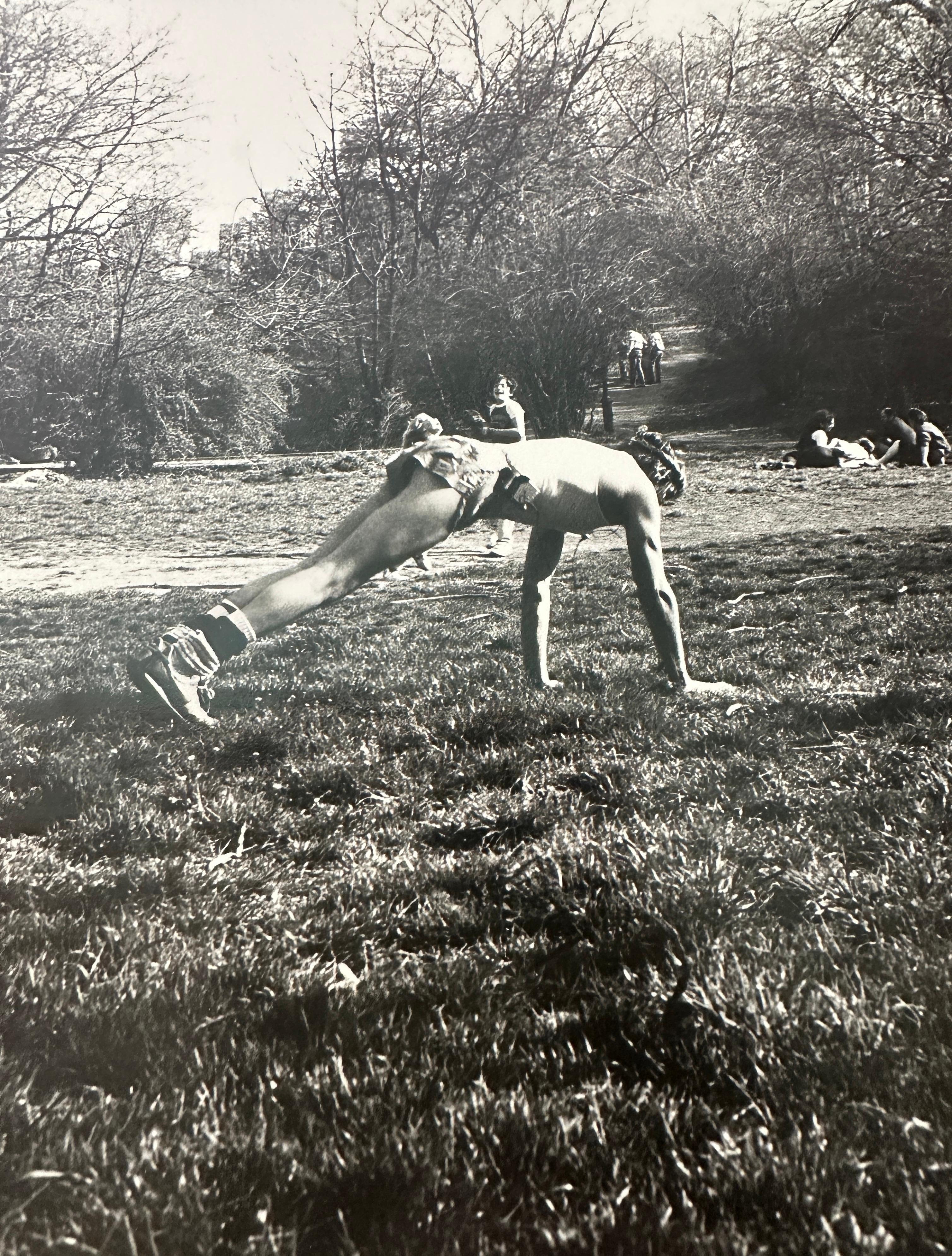 Jon Gould Yoga Pose Central Park - Noir Black and White Photograph par Andy Warhol