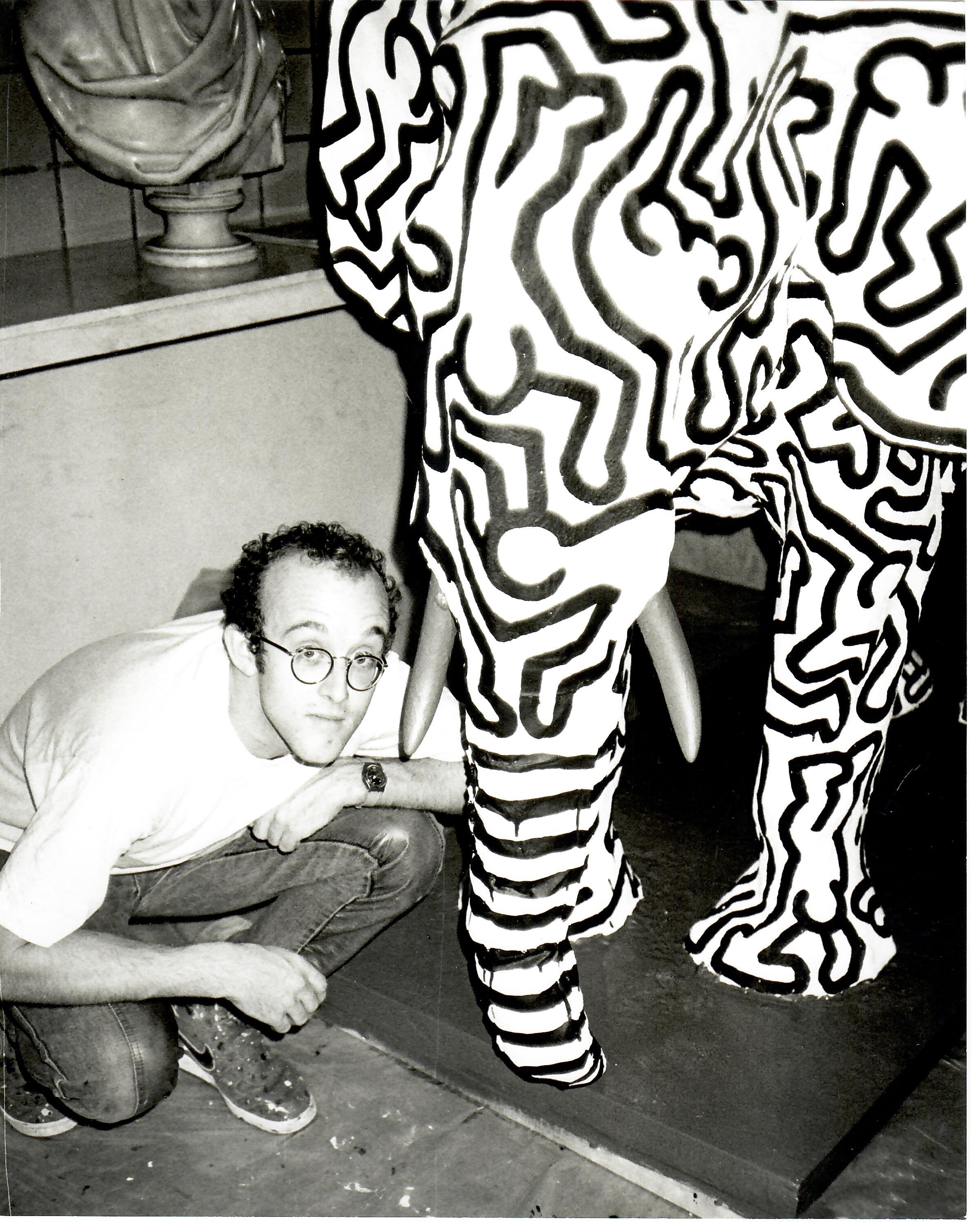 Andy Warhol Black and White Photograph - Keith Haring with Painted Elephant Statue at 22 East 33rd Street