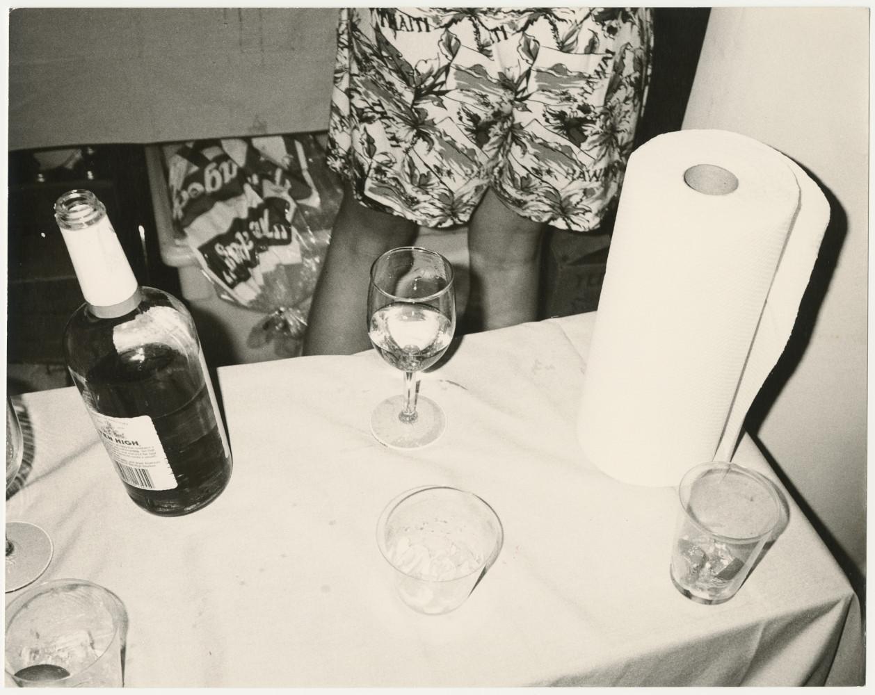 Andy Warhol Still-Life Photograph - Liquor bottle, glasses and paper towel still life