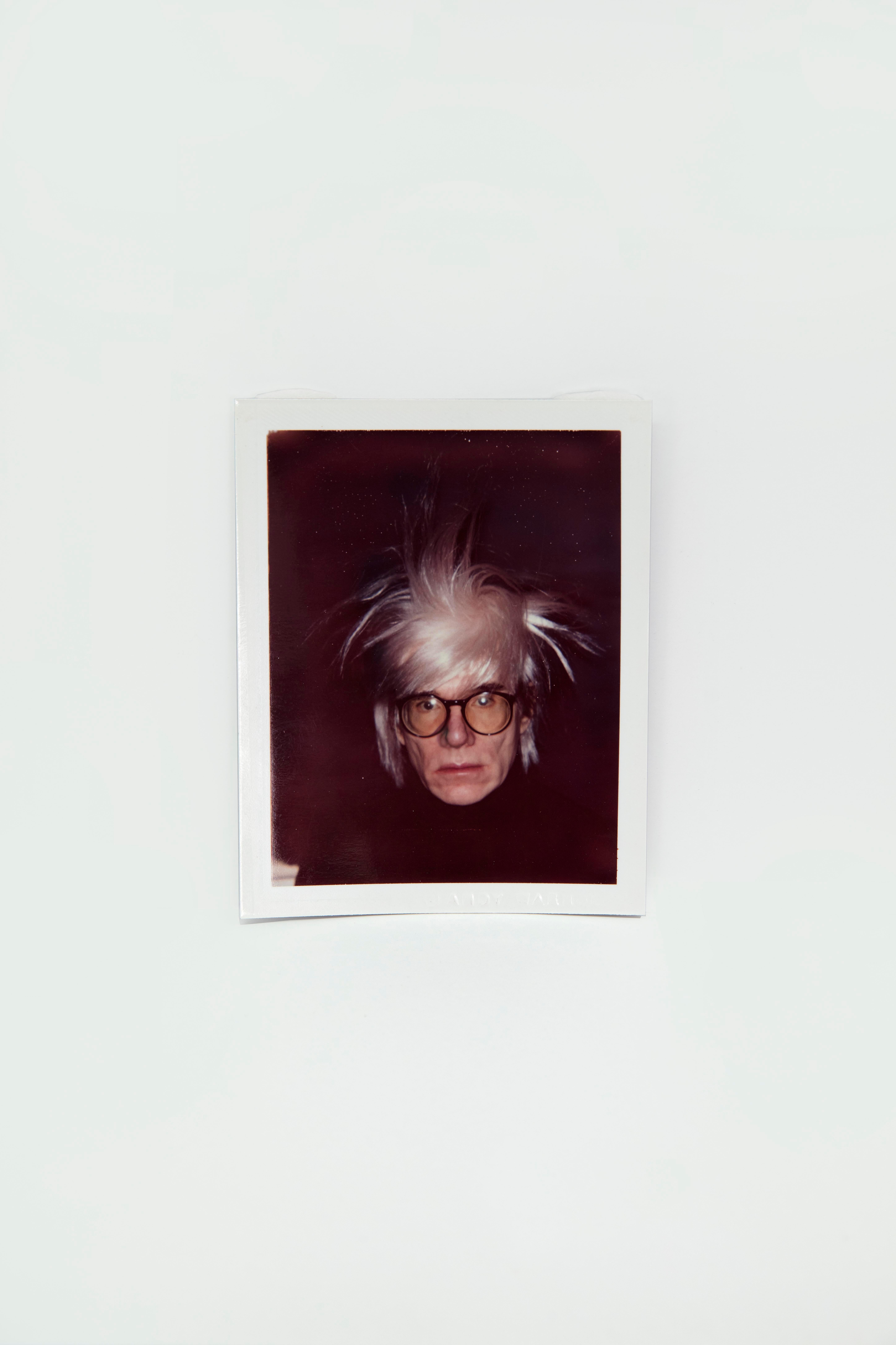 Polaroid of Self-Portrait in Fright Wig by Andy Warhol 