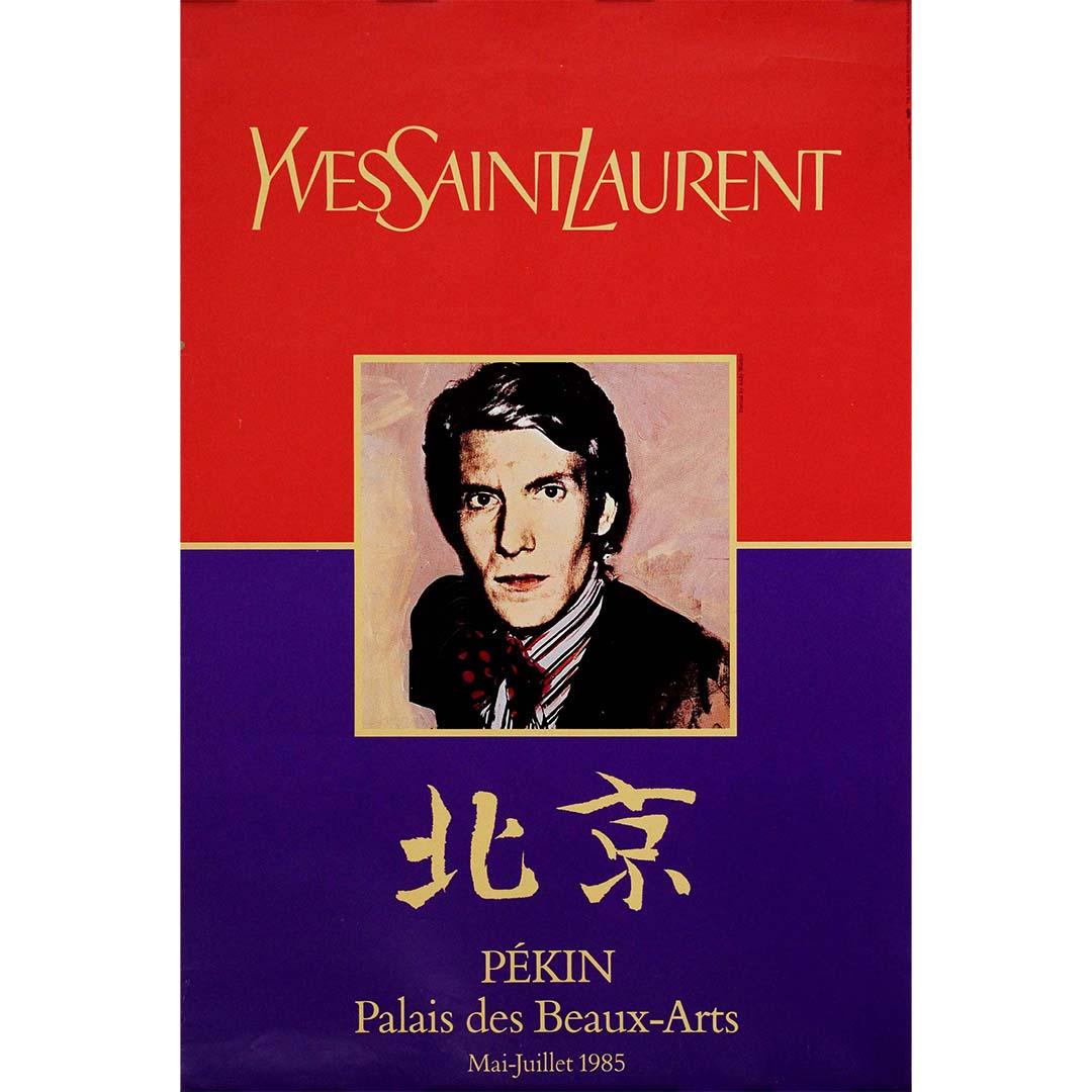 Andy Warhol's original exhibition poster for the 1985 collaboration between Yves Saint Laurent and Pékin Palais des Beaux-Arts embodies a remarkable convergence of fashion, art, and global cultural exchange. Crafted with Warhol's unmistakable style