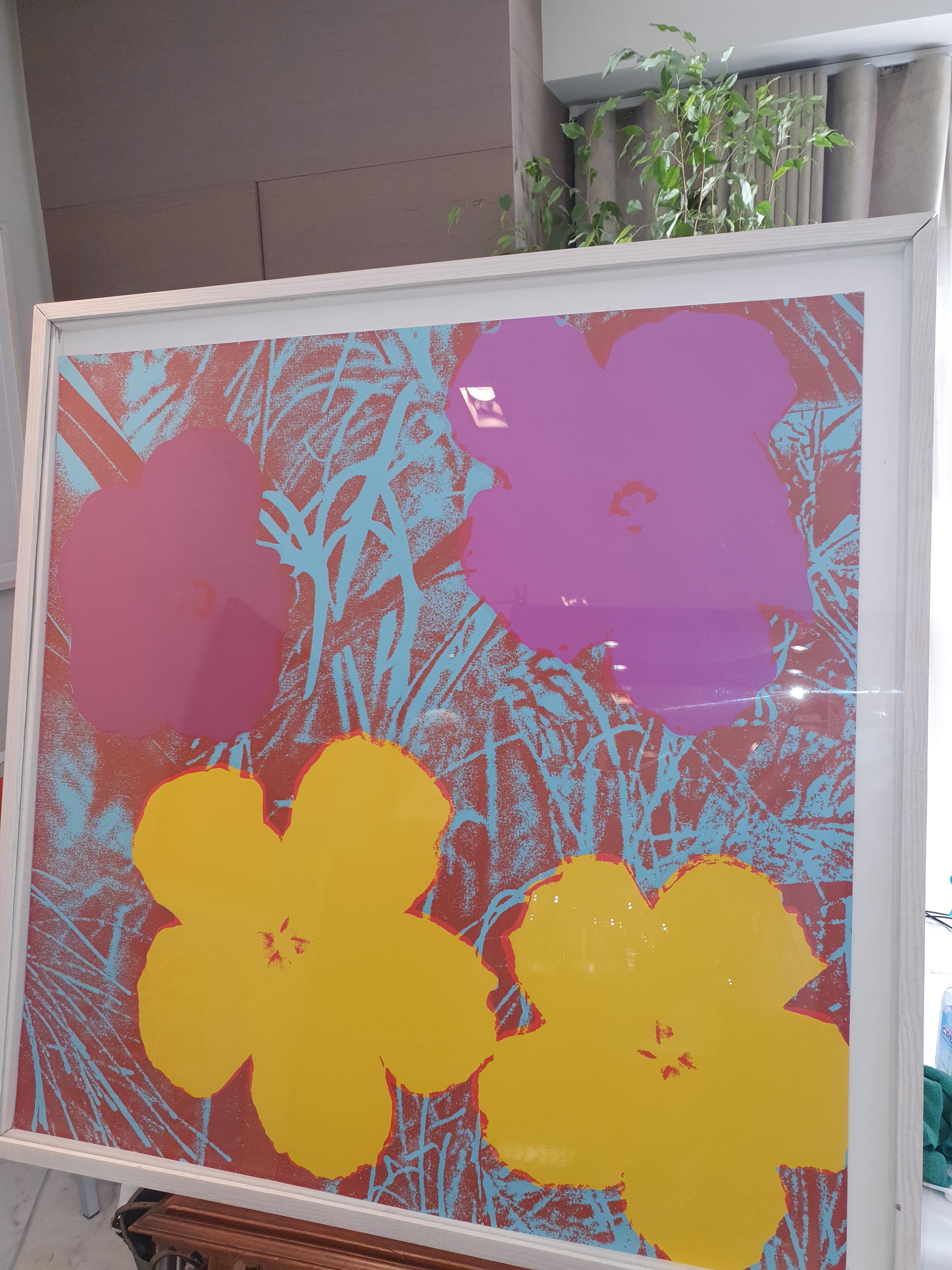 'Flowers' presumably by Andy Warhol is a beautiful serigraph unnumbered and signed and dated on the verso. Printed by Salvatore Silkscreen Co, Inc., New York, published by Factory Additions, New York Edition of 250 and 26 AP. 

This piece is apart
