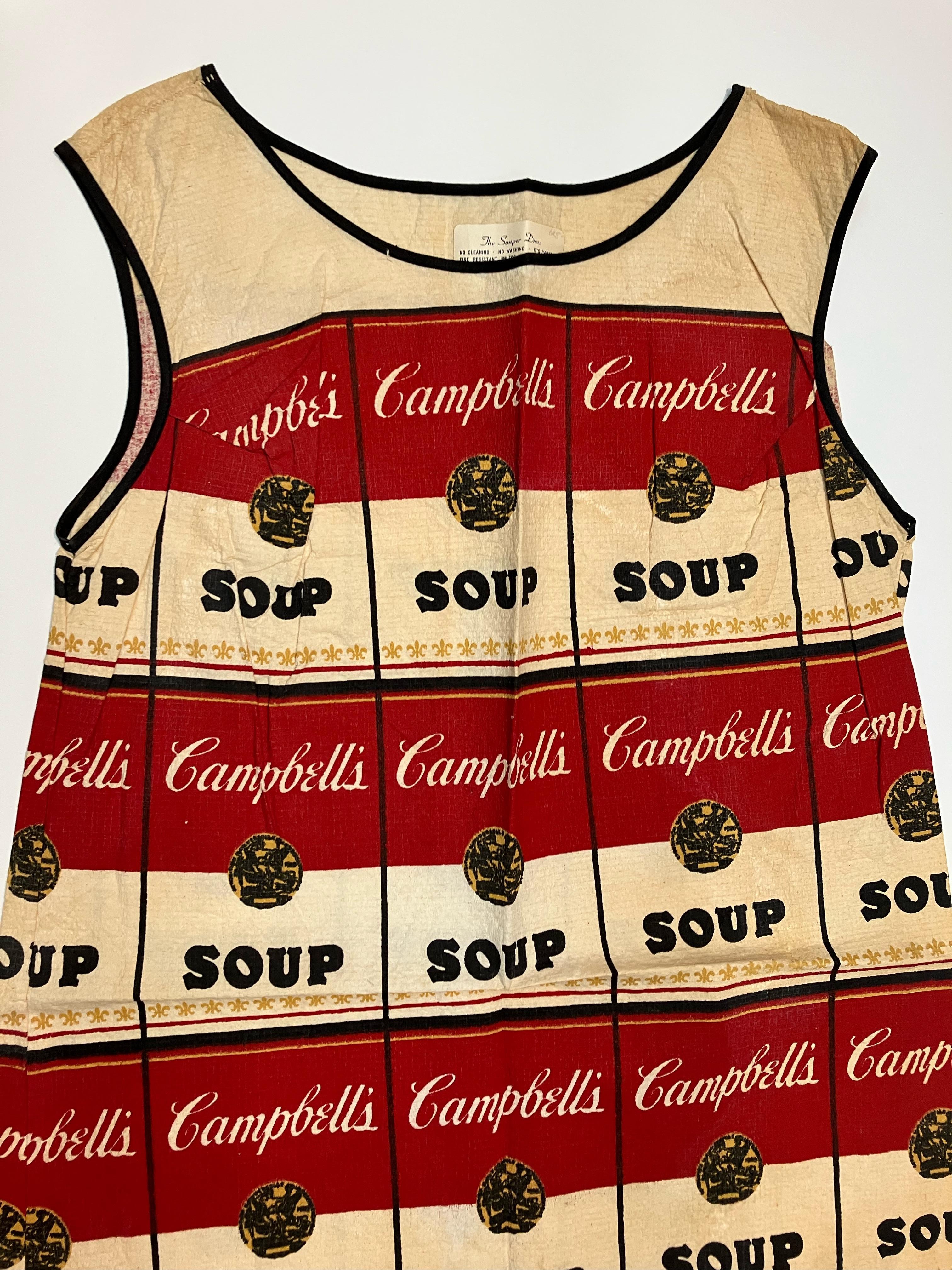 Andy Warhol The Souper Dress c. 1965-1967:
Inspired by Andy Warhol’s Campbell’s Soup Cans, this dress was sold by the Campbell’s Soup Company in the late 1960s as a form of advertisement, combining the fad of paper dresses with Warhol’s popularizing