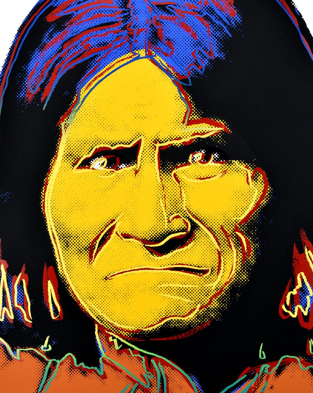 Andy Warhol Geronimo, 1986 is a stunning portrait of the Apache leader and medicine man. He is commanding and gazes directly at the viewer with piercing eyes. His strong facial features are outlined in yellow contours. The fiery yellow, red, and
