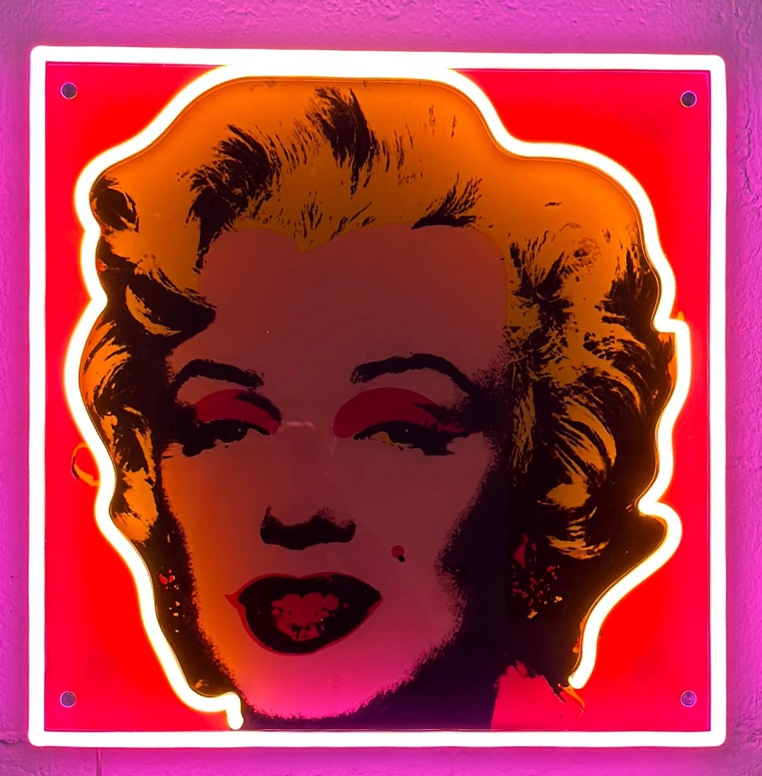 Andy Warhol
Marilyn Monroe (Pink), 2022
Acrylic-printed Marilyn lined with pink and yellow neon LED artwork with energy-efficient tubing, full board backing
Box is plate signed; accompanied by official COA authorized by the Warhol Foundation