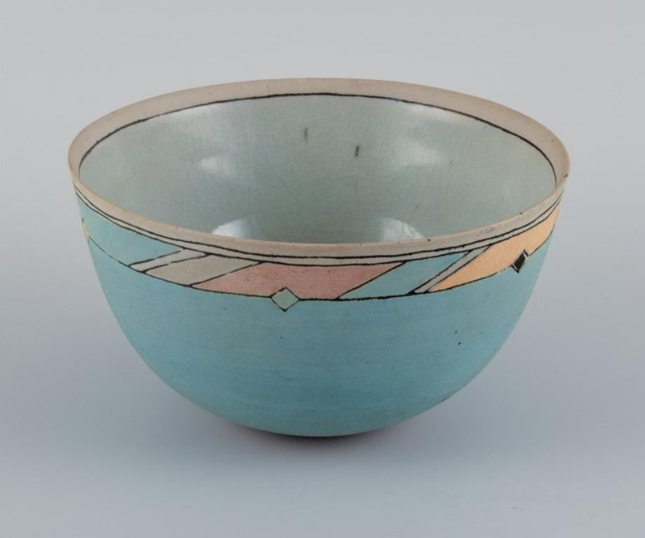 Ane-Katrine von Bülow, Danish contemporary ceramicist.
Unique bowl in turquoise with geometric fields.
Approx. 2000.
Signed.
Dimensions: D 17.0 x H 9.5 cm.