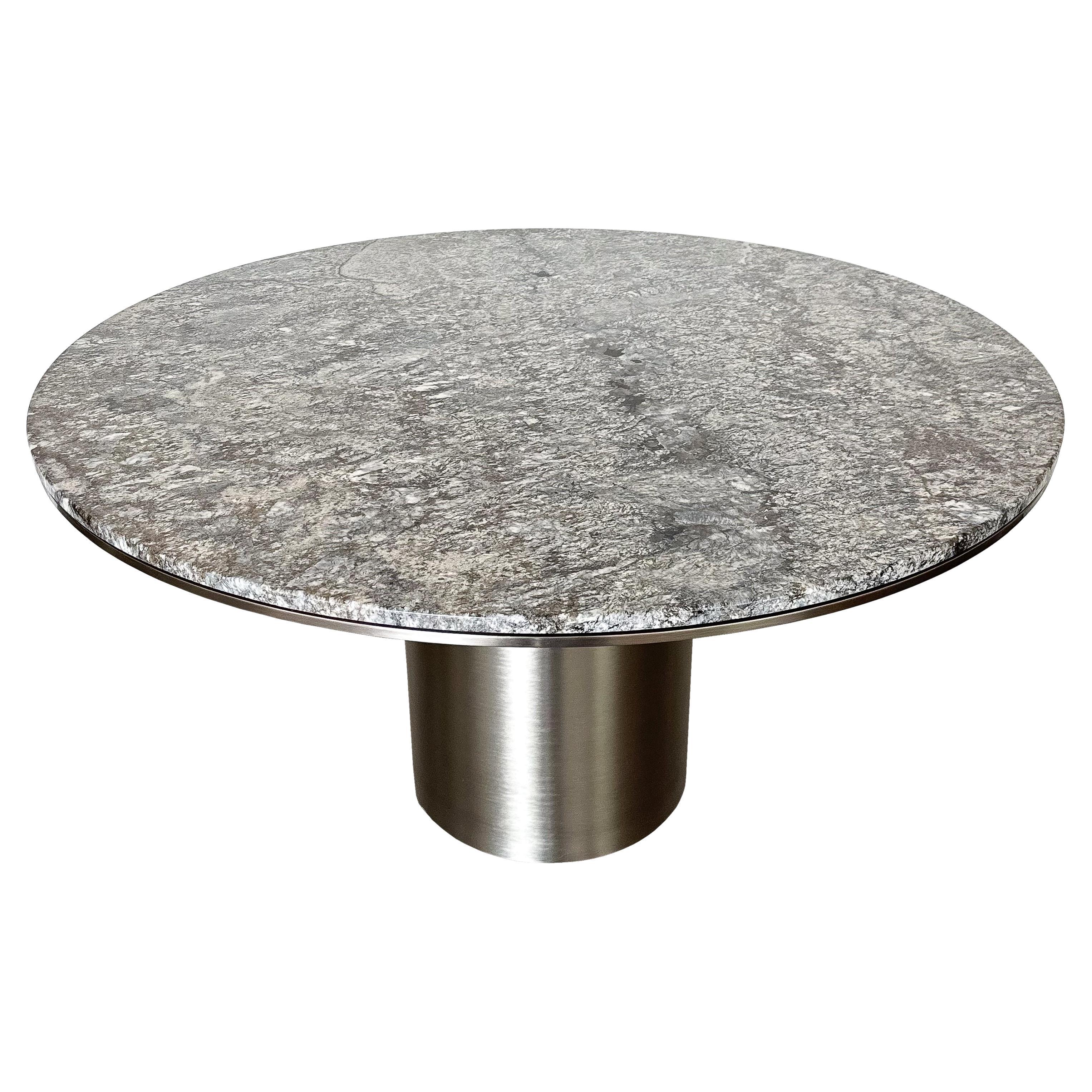 Anello Pedestal Dining Table by Brueton 