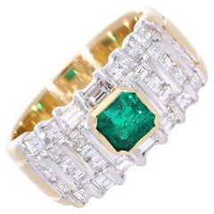 Bandring mit zentralem Smaragd ct 0,75 und Diamanten ct 1,45 in 18 Kt Gold