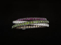 Anello a Fascia Intrecciata con Cinque File di Pietre. Diamanti per ct 0.96.