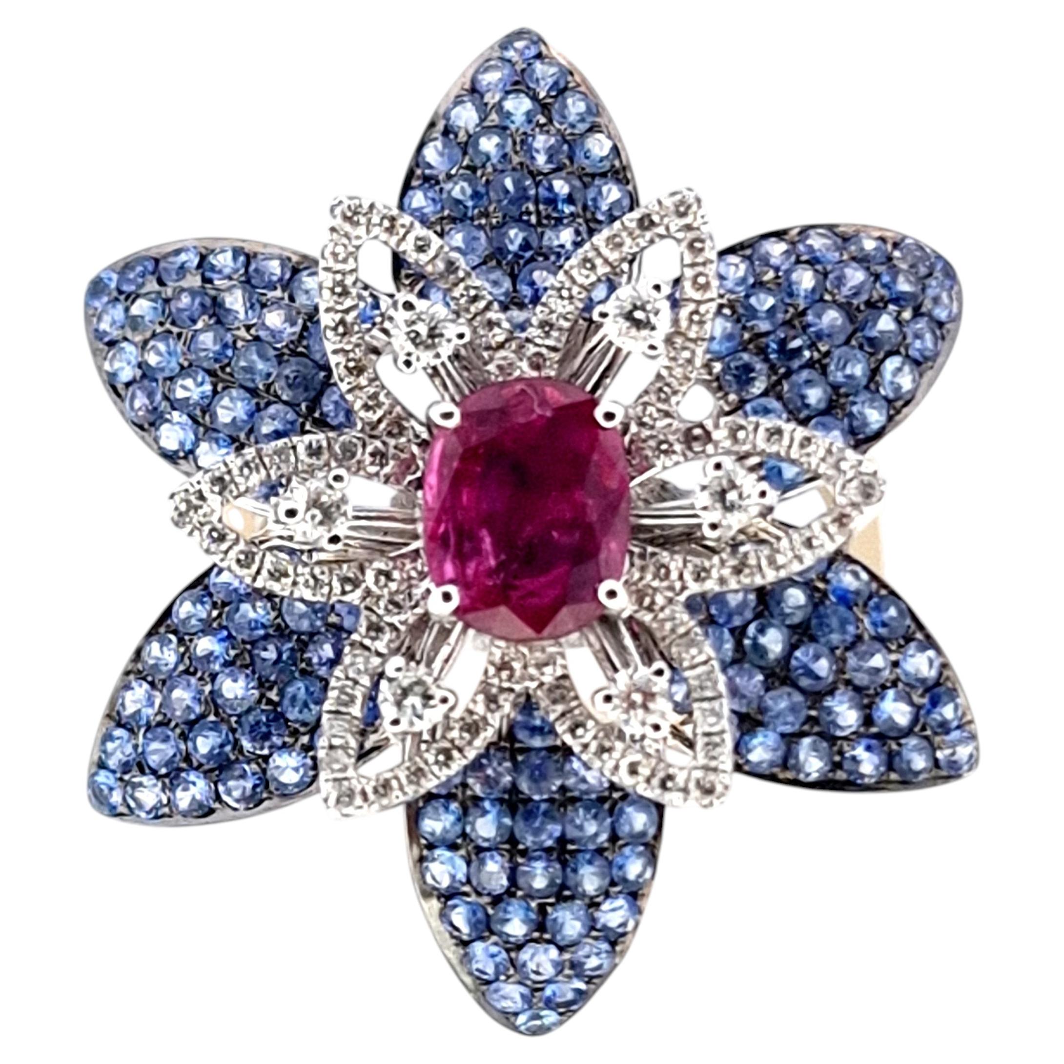18Kt White Gold Flower Ring with 1.71 kt Ruby, Sapphires and Diamonds. For Sale
