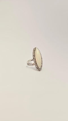Antique Ring in 18 Kt White Gold, Noble Opal and Diamonds. C1960's
