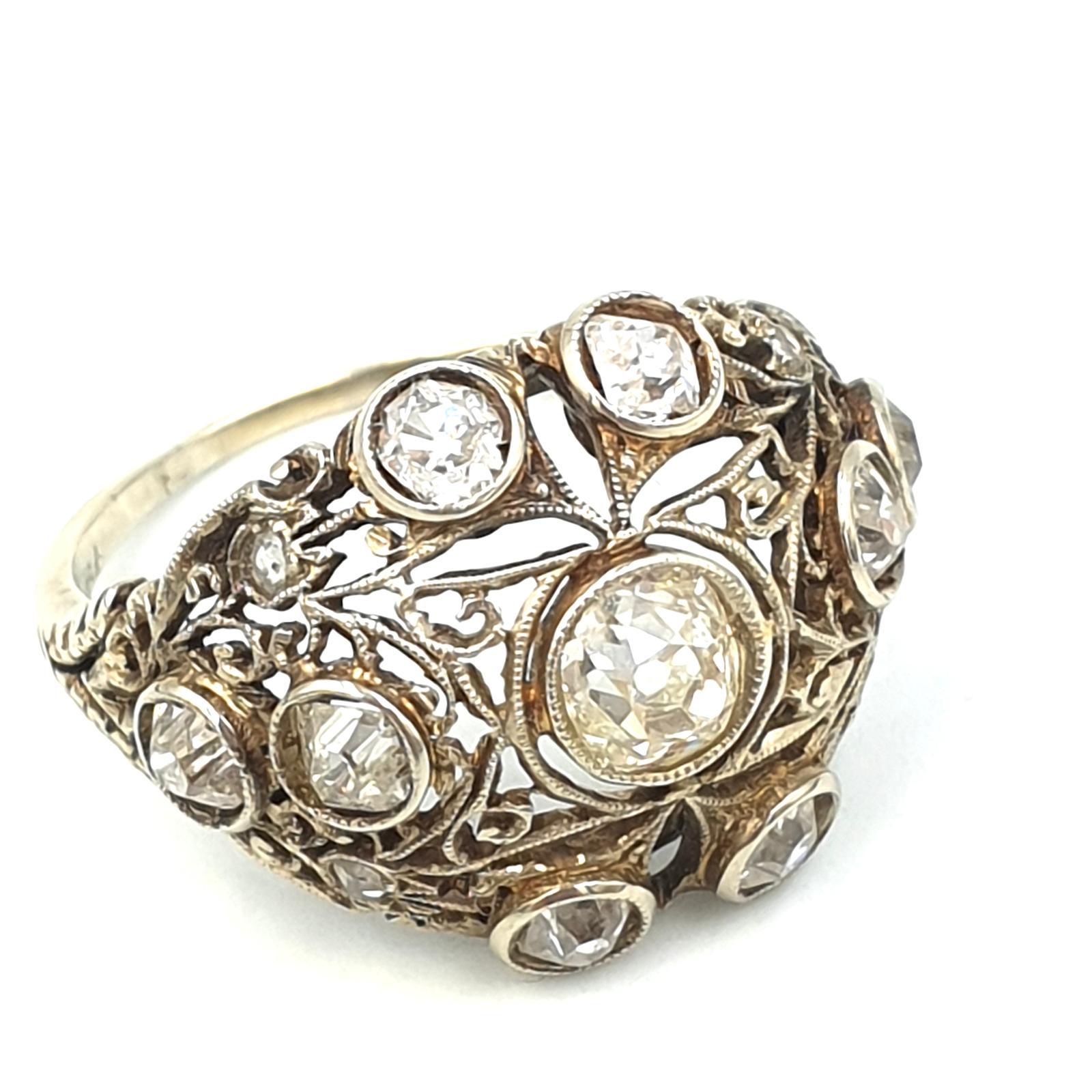 Handcrafted, Art Nouveau-style Italian ring, dating from the early 1900s. Made of solid 18-karat white gold, with top-quality, antique-cut natural diamonds with a total carat of 2.2 carats.
 
Weight 4.4 grams. The Italian size of the ring is 13, the