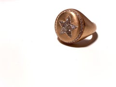 CASSIOPEA ring in rose gold and diamonds ct 0.93, red enamel star inside