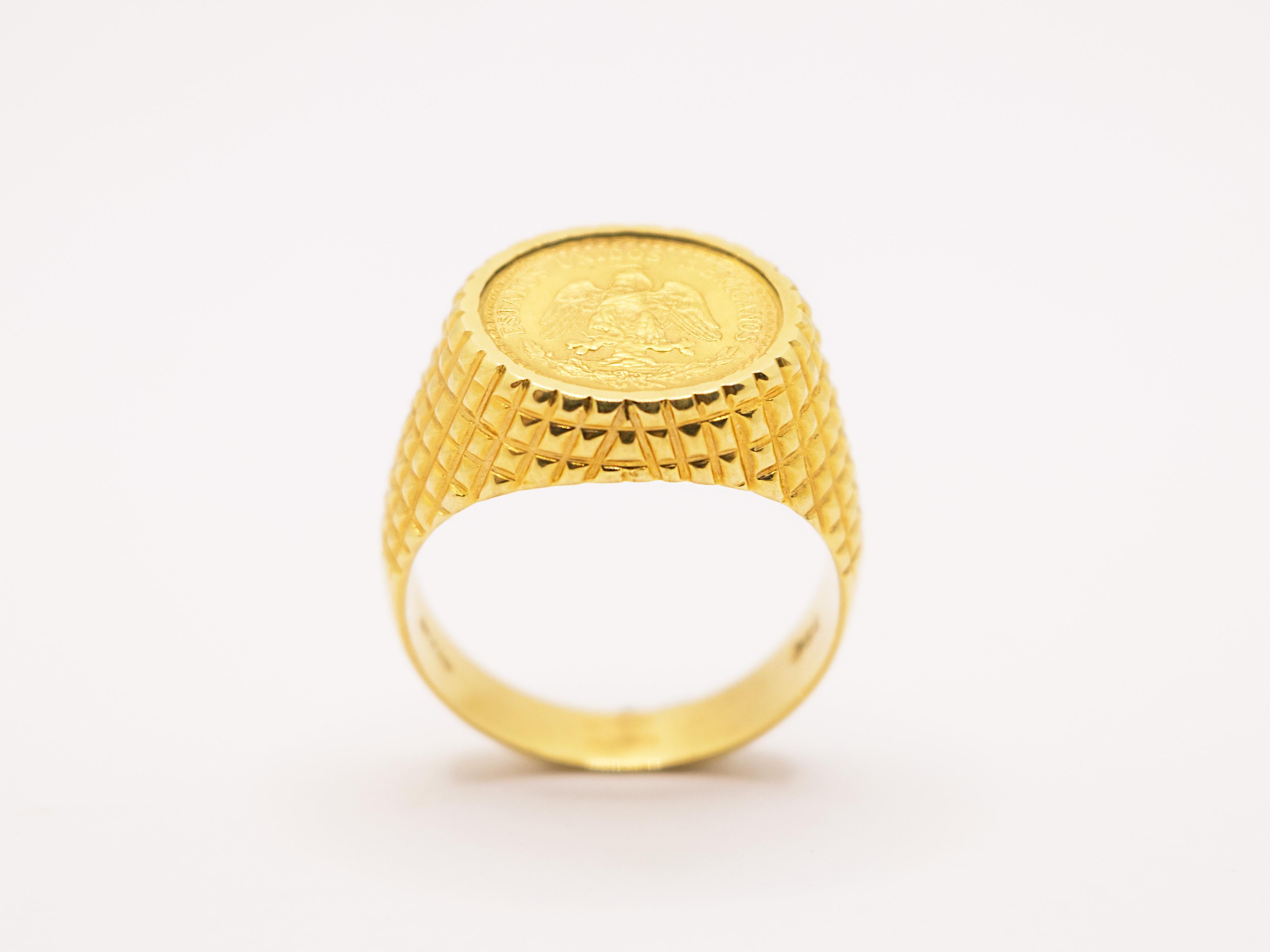 A classic 18kt yellow gold chevalier ring set with a Mexican Dos Pesos coin.
This ring can be worn either as a pinky ring or as a ring finger or middle finger ring.
It can be easily widened or tightened to size.
It has beautiful brickwork, a design