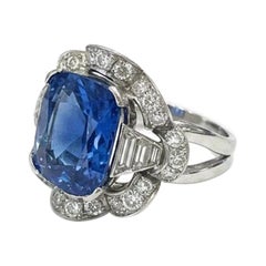 Ring with a 12.20-carat blue sapphire (UNHEATED), IGI-certified, and diamonds