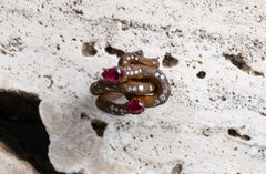 Contemporary grape shoot ring with diamonds and rubies in titanium