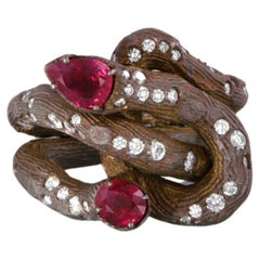 Contemporary grape shoot ring with diamonds and rubies in titanium