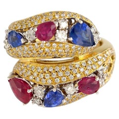 Handmade Contrarié ring in 18kt yellow gold with Rubies, Sapphires and Diamonds