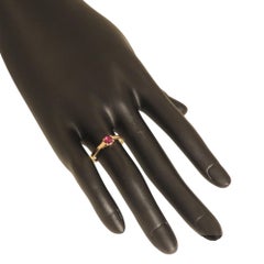 Bague de fiançailles en or rose et rubis