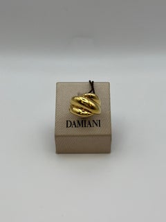 Anello Damiani Gomitolo in oro 18 kt. con diamante _ Iconico design italiano